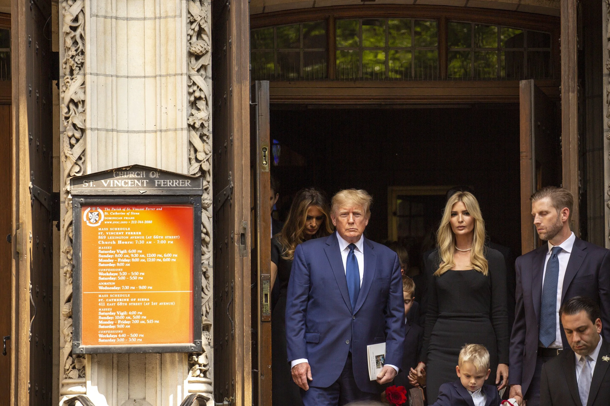 Donald Trump stands at the entrance of a church in Manhattan during the funeral of his ex-wife, Ivana Trump. Taken for Business Insider.