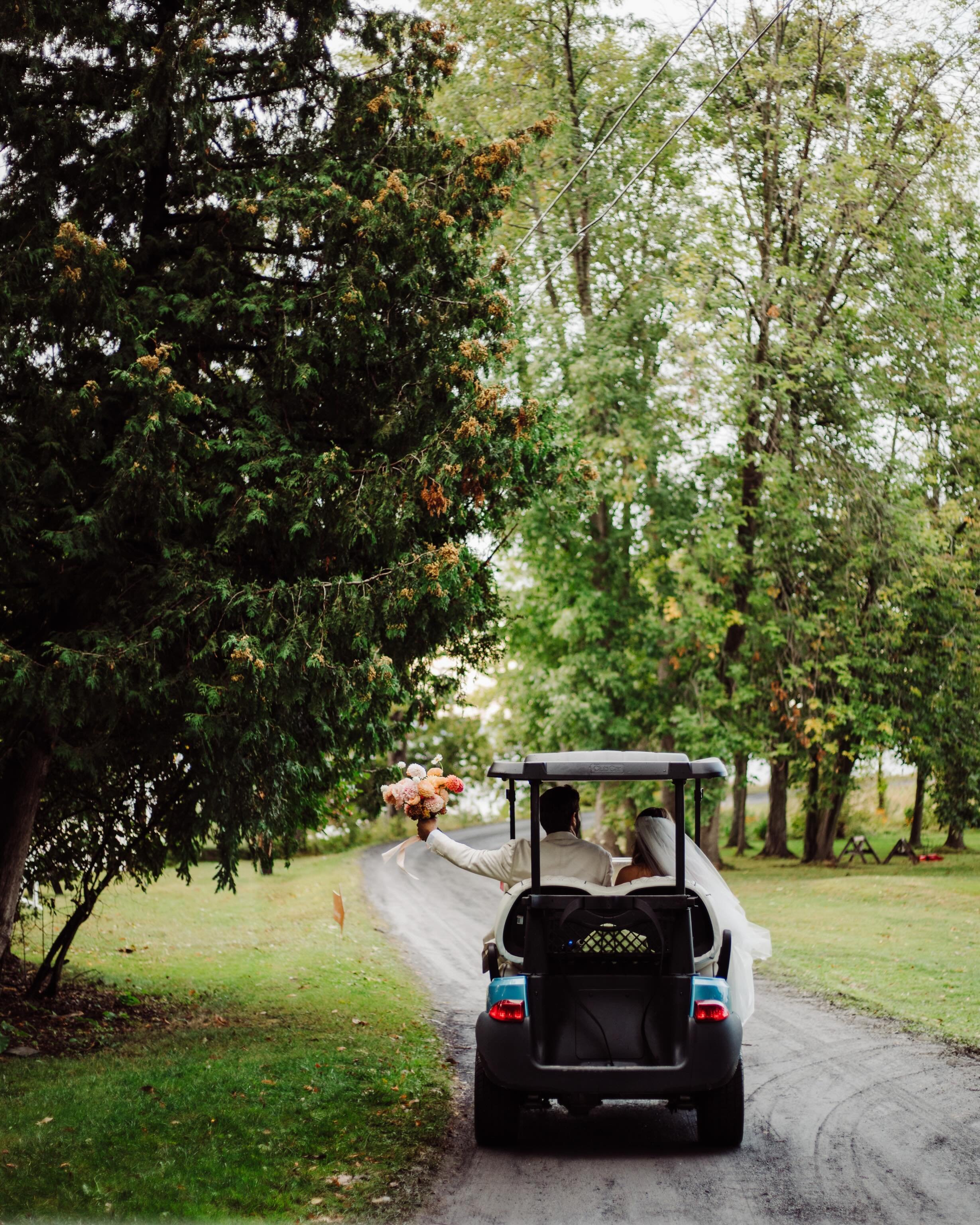 down winding paths and through the greens 

a different kind of arrival ✨ #golfcourseweddings #vermontwedding #lakesidewedding