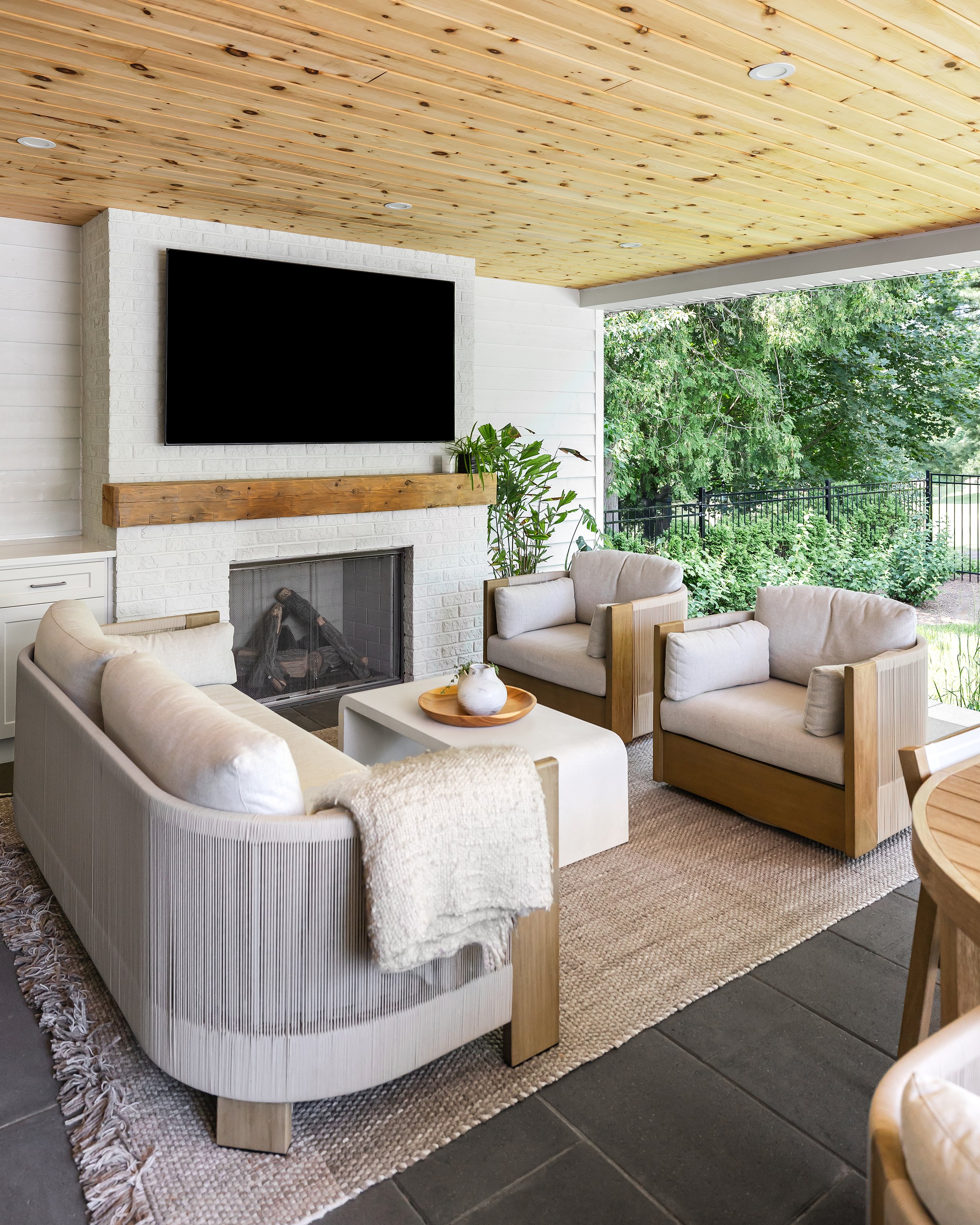 How I Turned Our Covered Patio Into an Outdoor Living Room