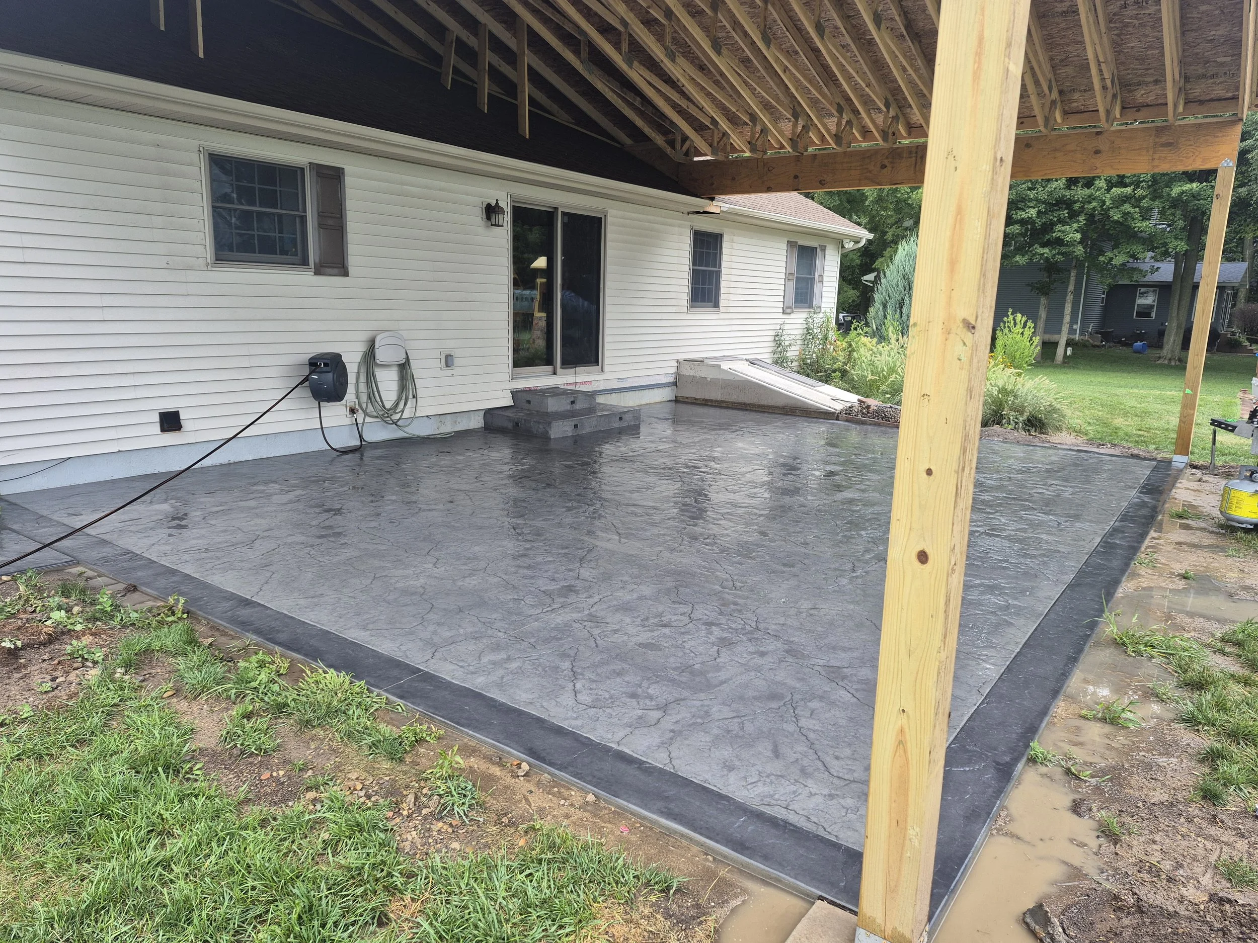 Patio with stamped concrete, quality construction.