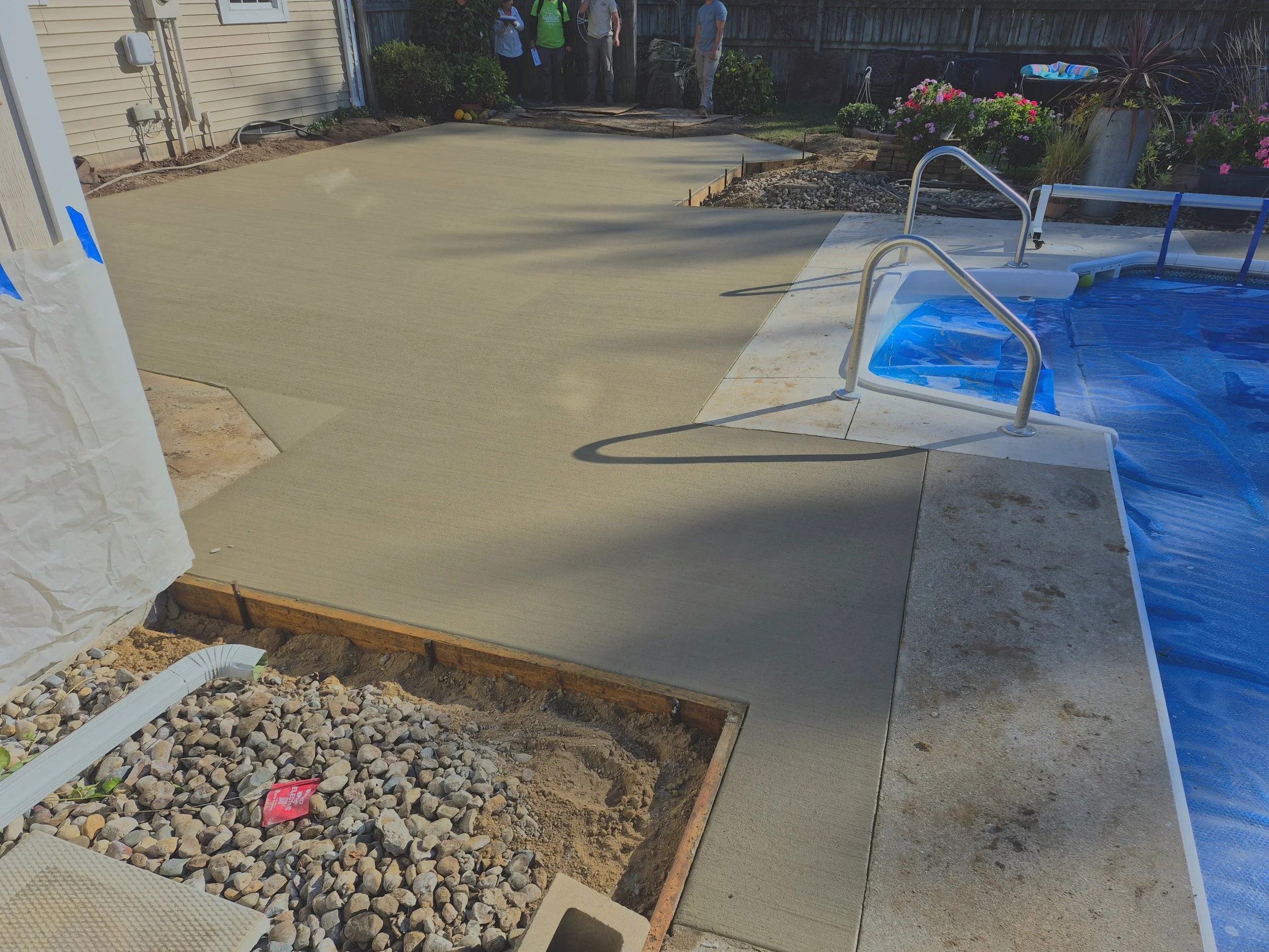 Professionally poured residential pool deck concrete. 