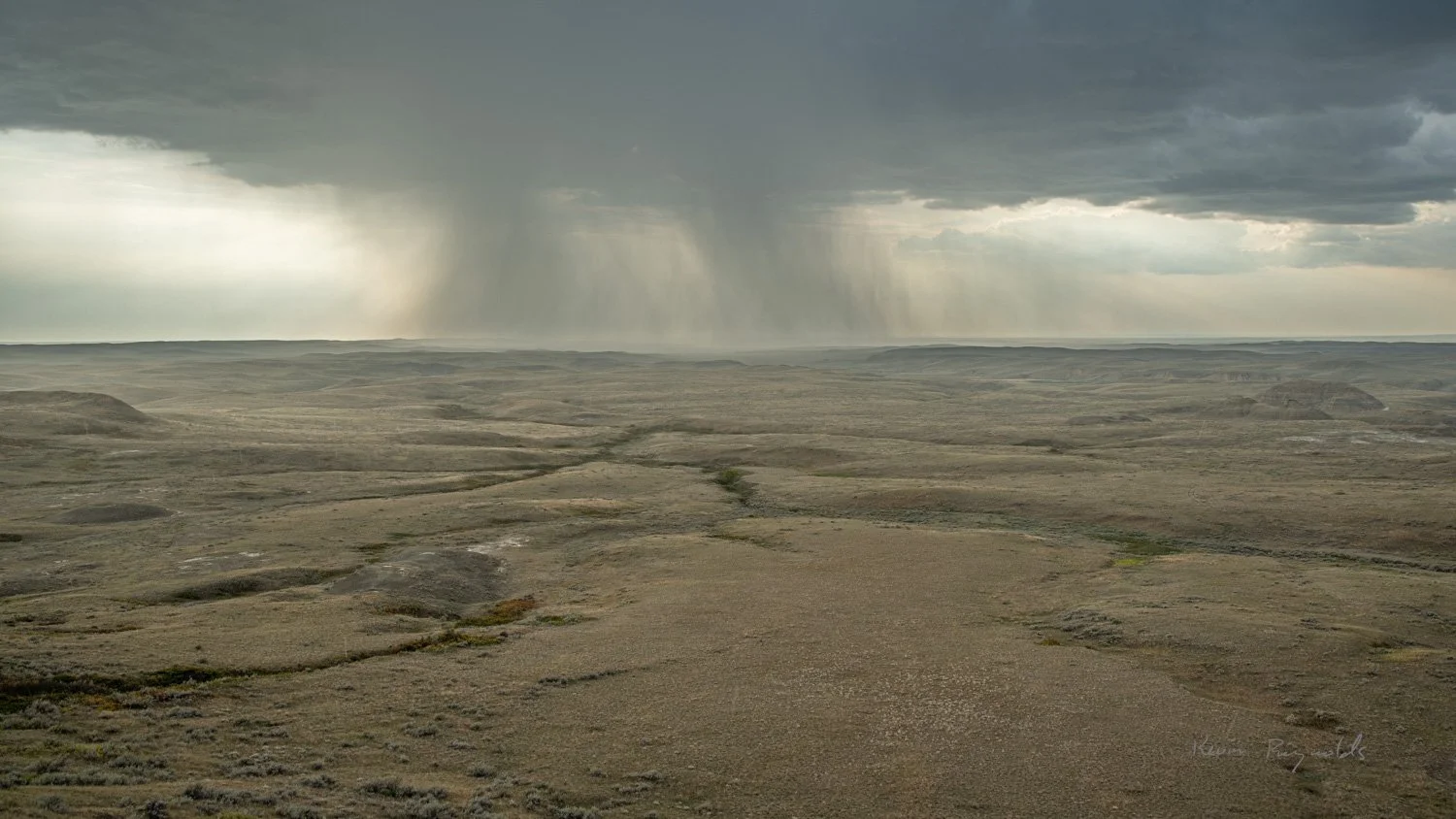 Rain squall over the East Block of Grasslands National Park, SK