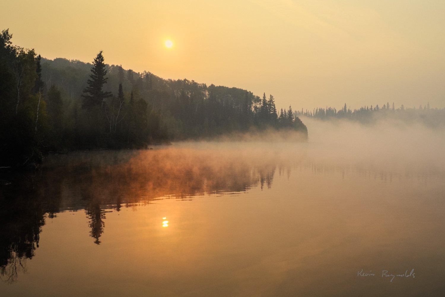Smoky sunrise in the Churchill River region, SK