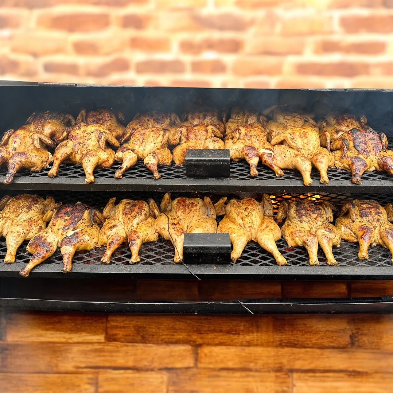 Photo of a rack of perfectly smoked and season chicken