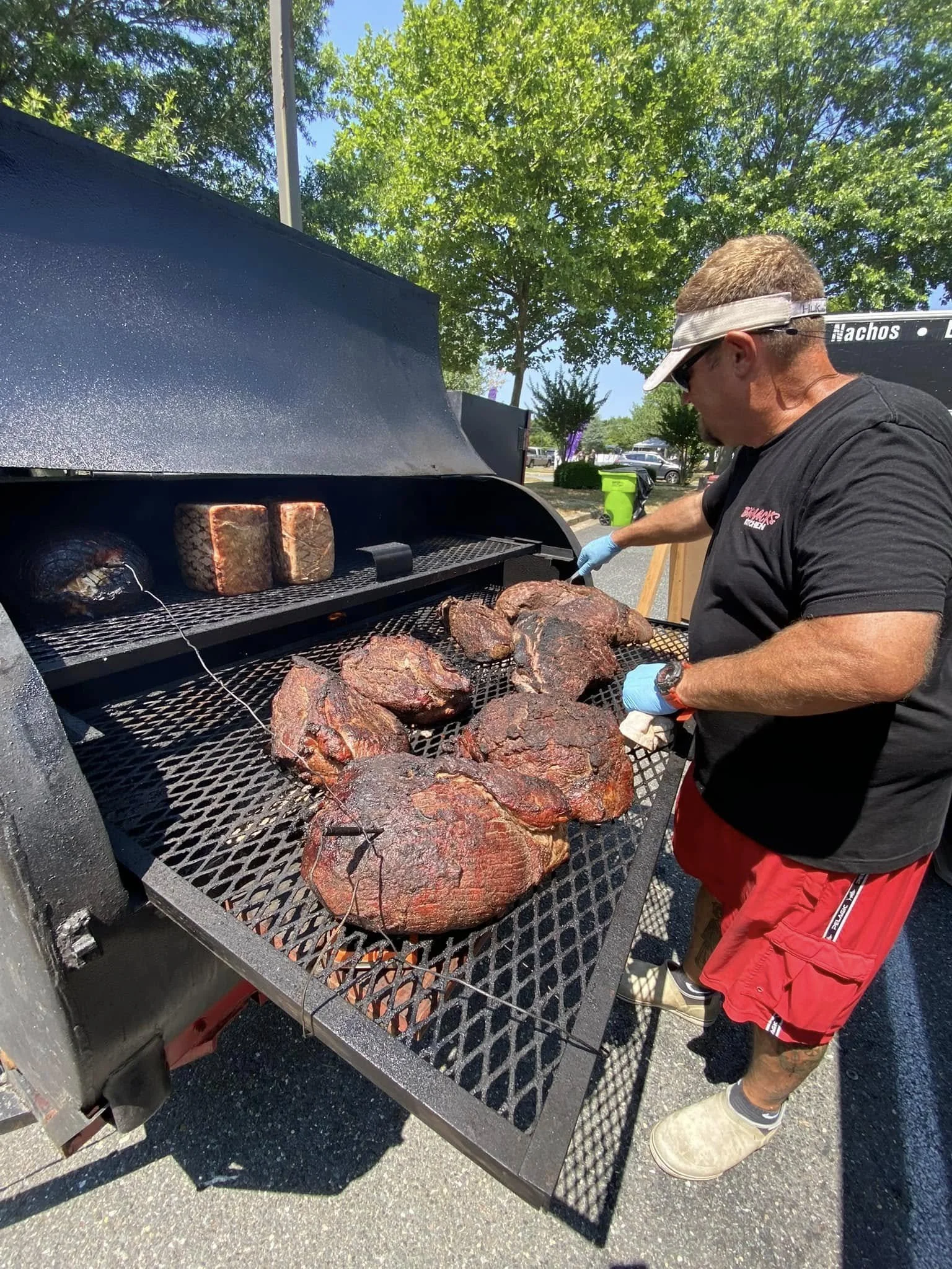 Image of Chris Mack overseeing his legendary smoked pit beef