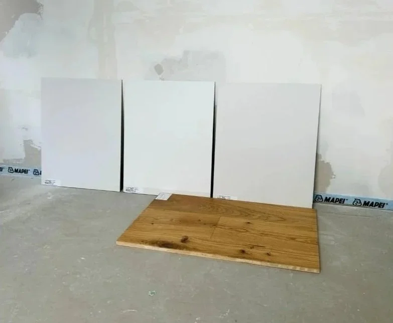 Professionelle Bodenverlegung im Wohnbereich mit modernem Holzboden und sauber ausgeführten Übergängen für eine stimmige Raumwirkung