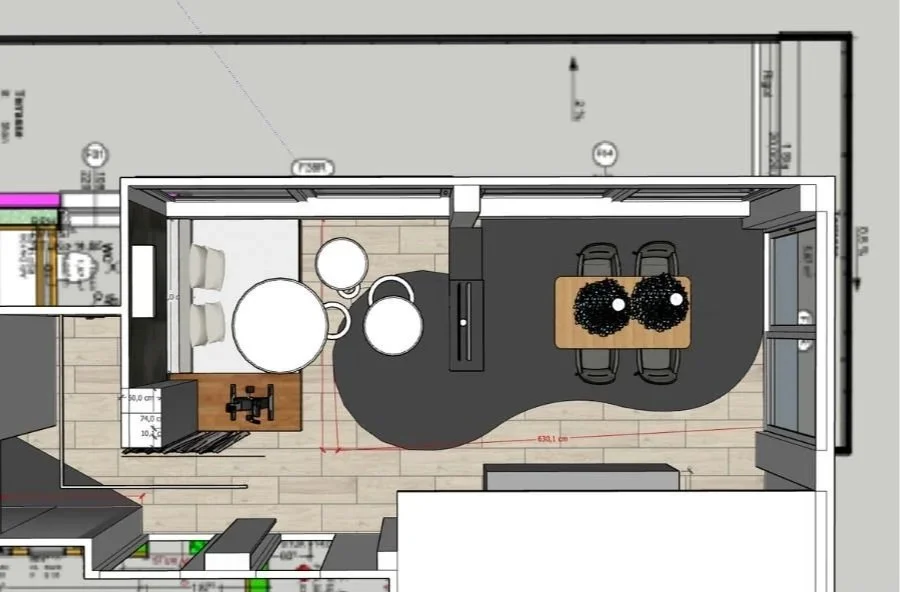 Grundriss eines Wohnzimmers mit Küchenbereich, Essplatz und TV-Fläche.