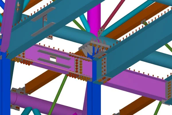 Close-up of a colorful roller coaster track with blue, purple, green, orange, and pink sections, showing bolts and structural connections.