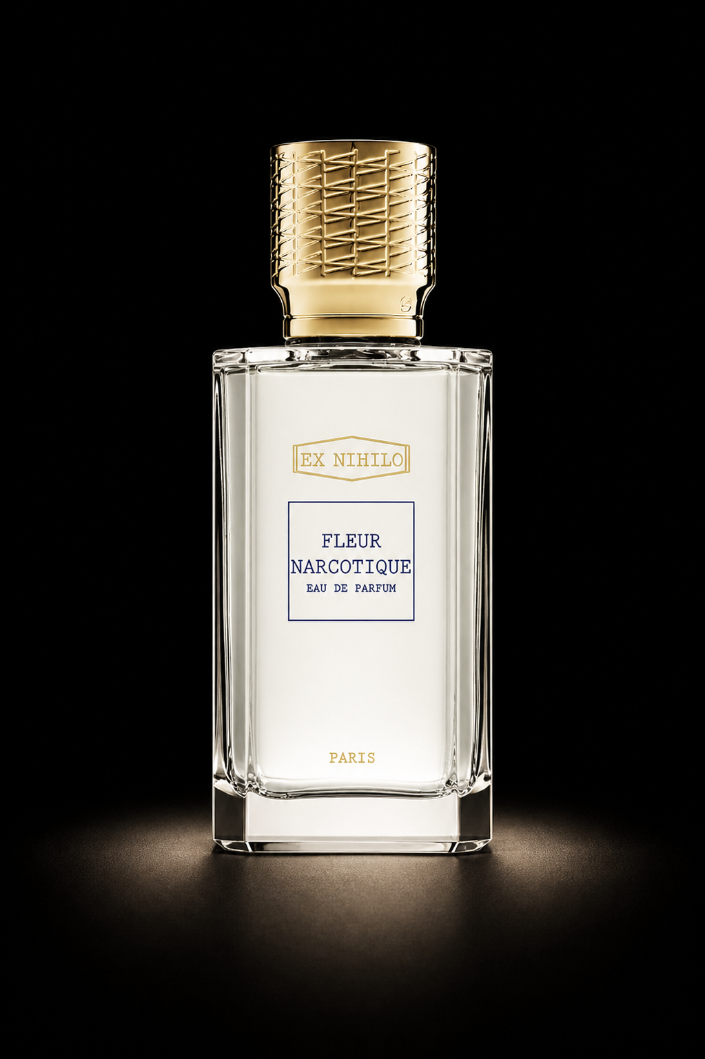 Flacon de parfum transparent avec capuchon doré, contenant un parfum appelé 'Fleur Narcotique', fabriqué à Paris.