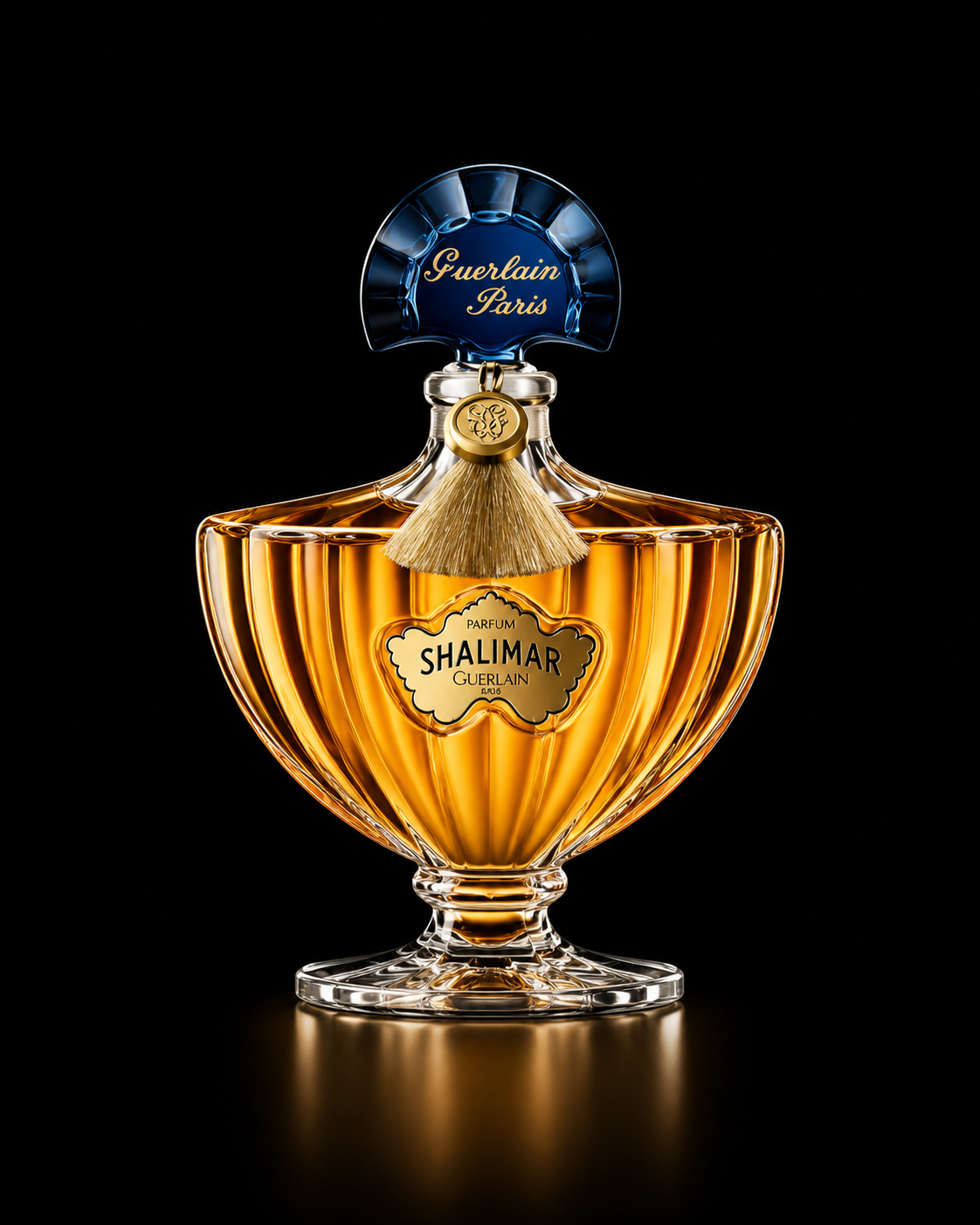 Flacon de parfum Guerlain Shalimar avec bouchon bleu et décoration en forme de pinceau