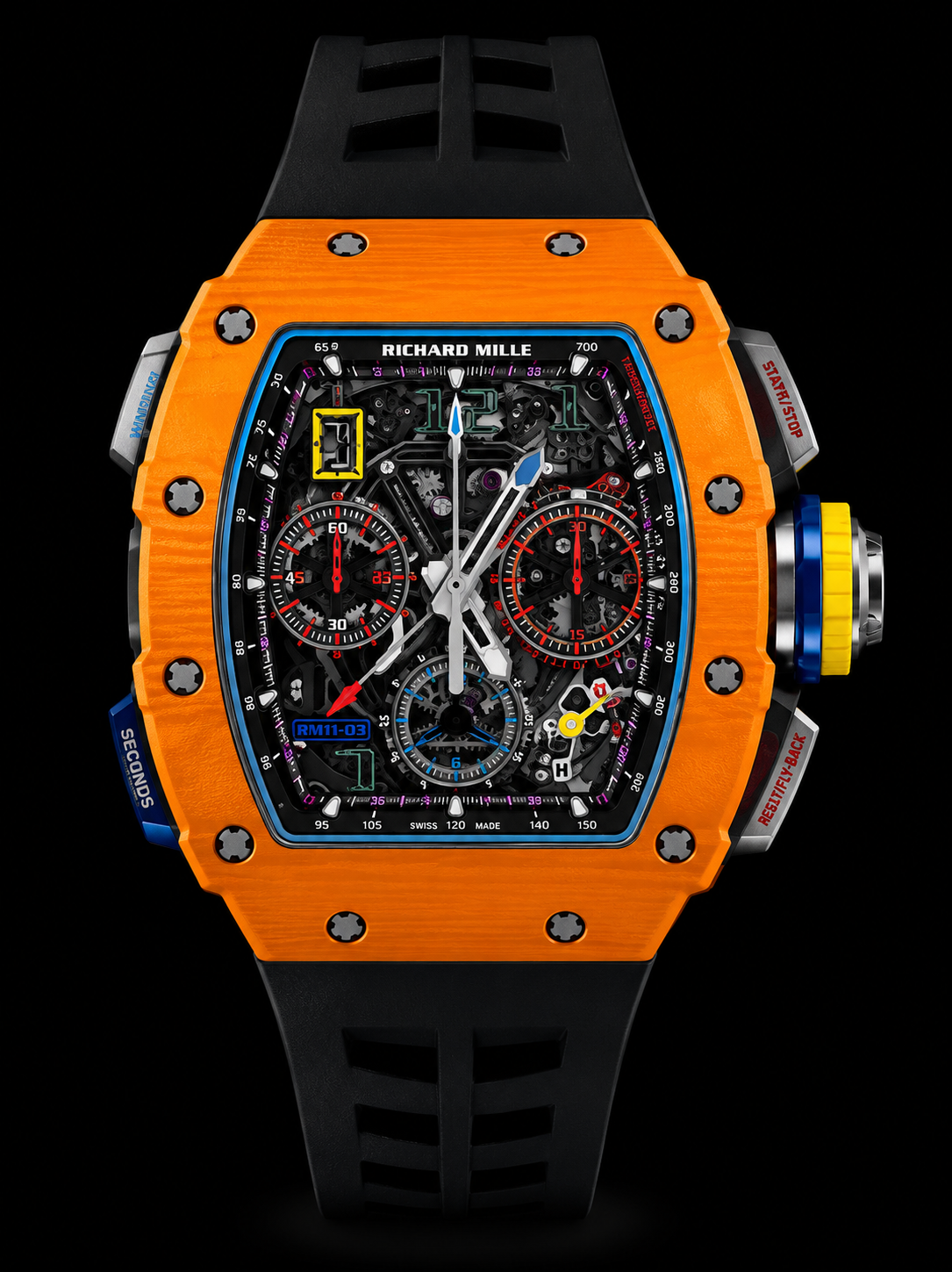 Montre de luxe avec un boîtier orange vif, cadran complexe, chiffres et sous-cadrans en rouge, bleu et jaune, bracelet noir en caoutchouc.