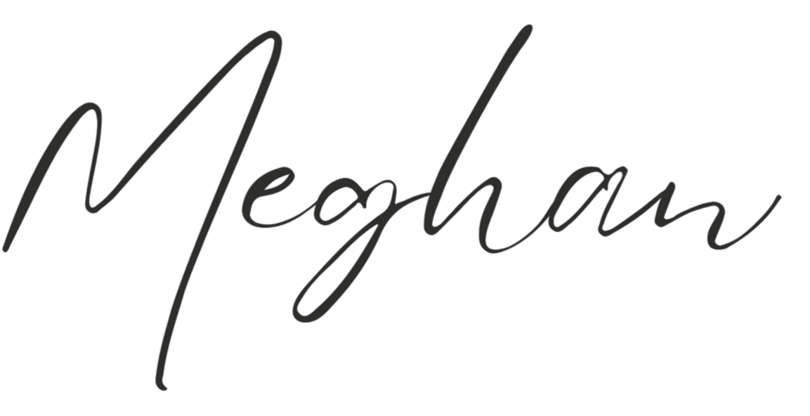A black background with the handwritten word 'Meghan' in cursive font.