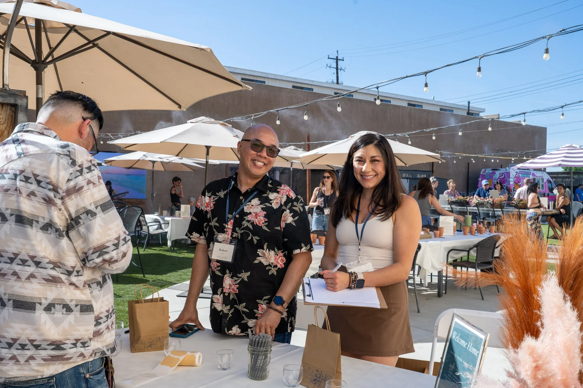 Drew Wiggins and a Soul Fair contributor welcoming attendees at the Wayfinding Collective Spring Equinox gathering, Bakersfield