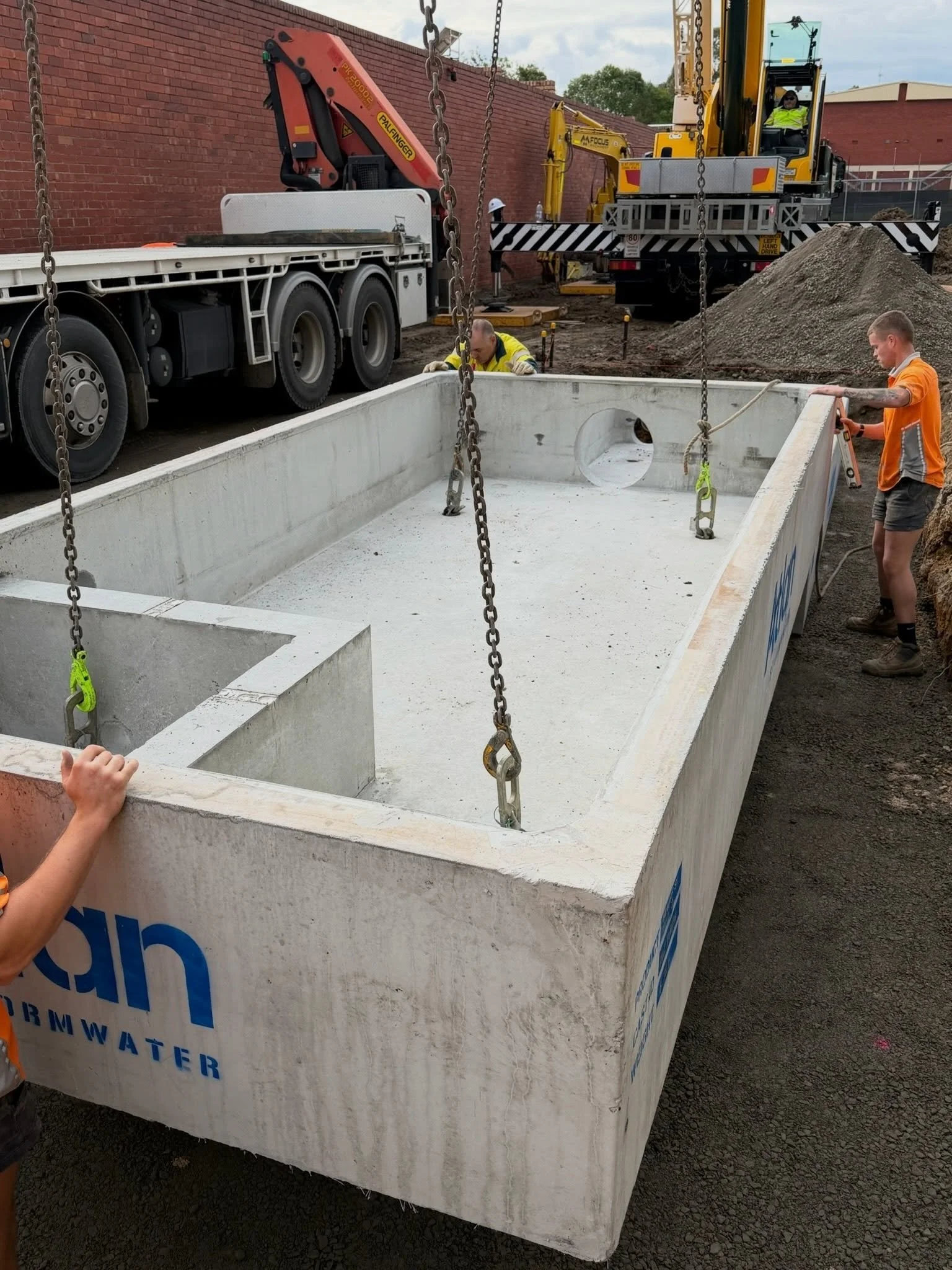 MITCHAM | Civil works progressing

Detention tank sections lifted in

Plumbing @fuchsplumbing 
Excavation @fuchsplumbing