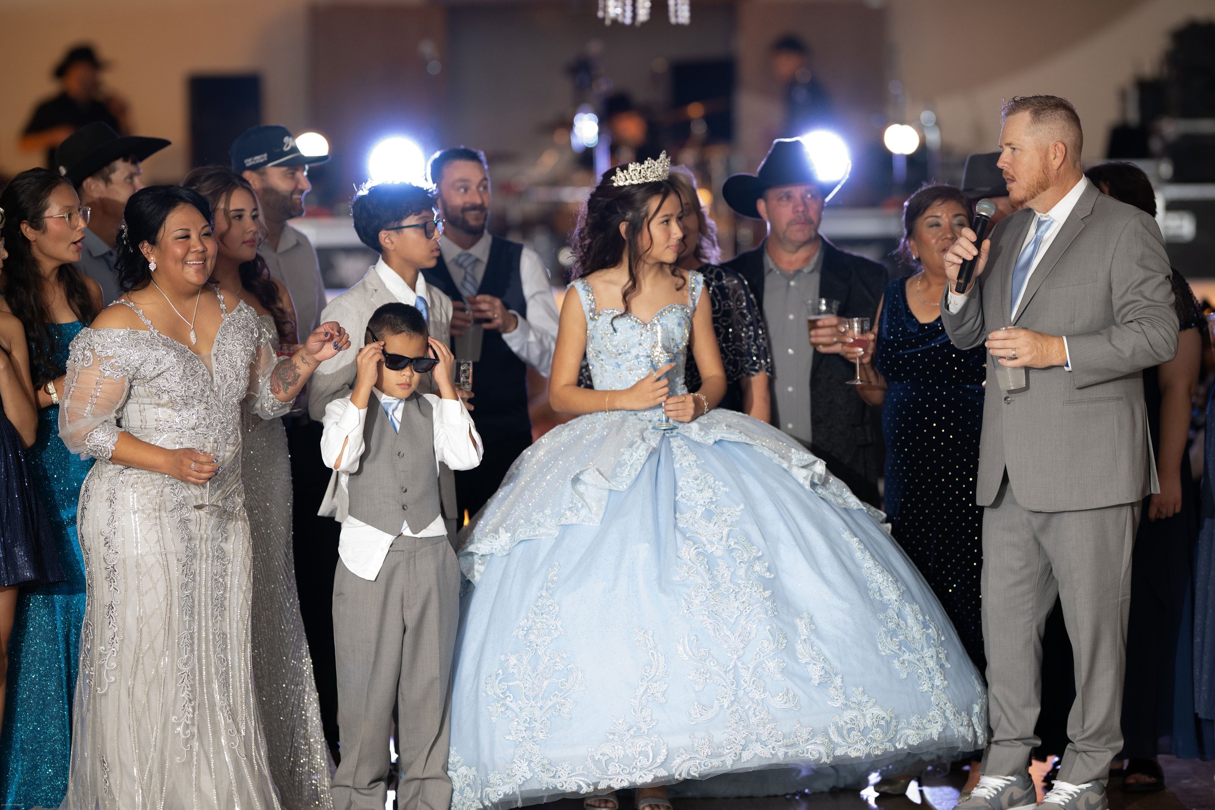 Quinceañera toast with family and friends during the celebration.