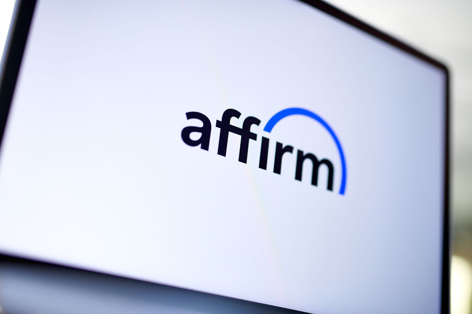 Computer screen displaying the Affirm logo with the word 'affirm' and a blue arc over the letters 'rm'.