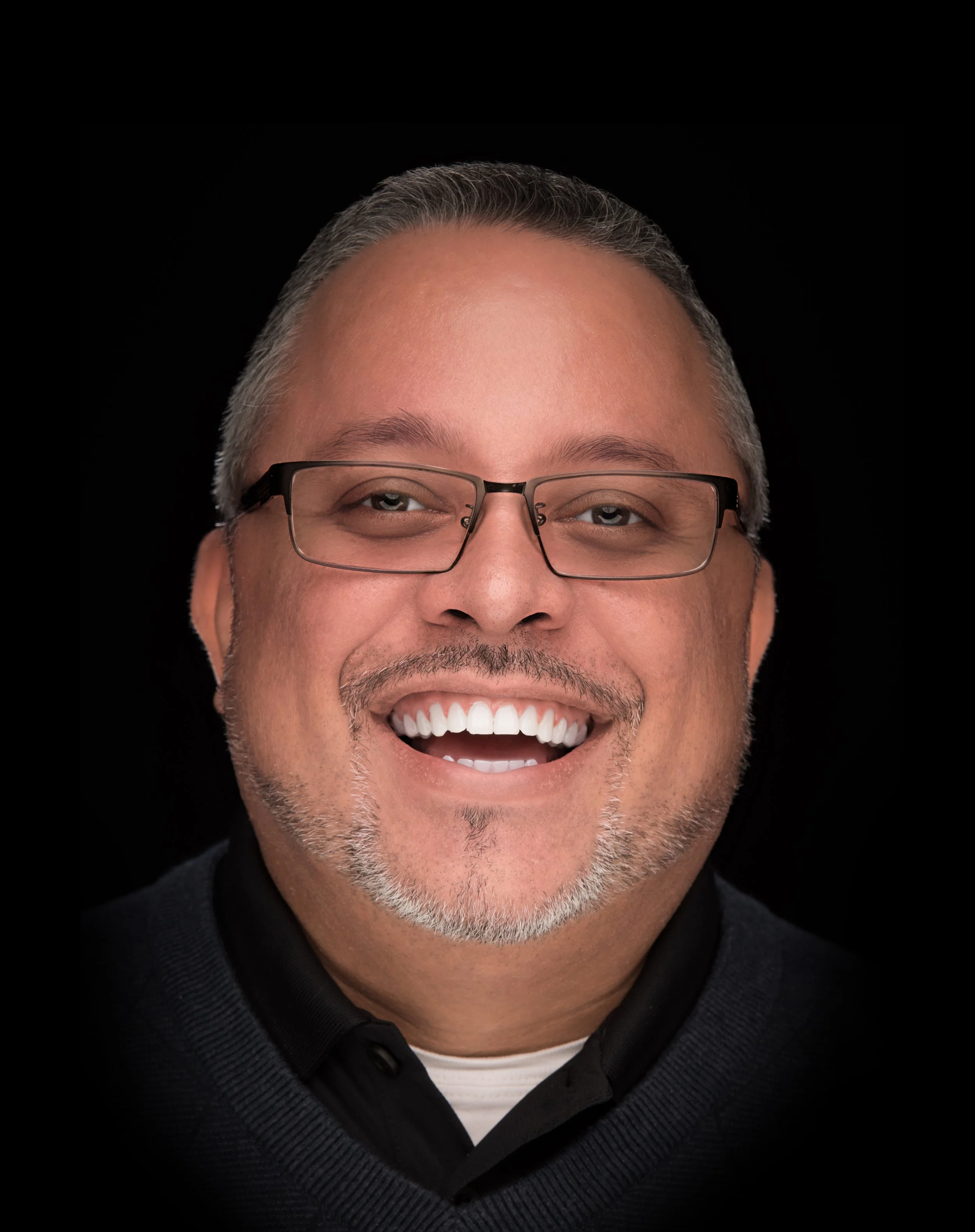 Professional headshot of Hector Torres, luxury quinceañera and wedding photographer based in the Dallas–Fort Worth area.