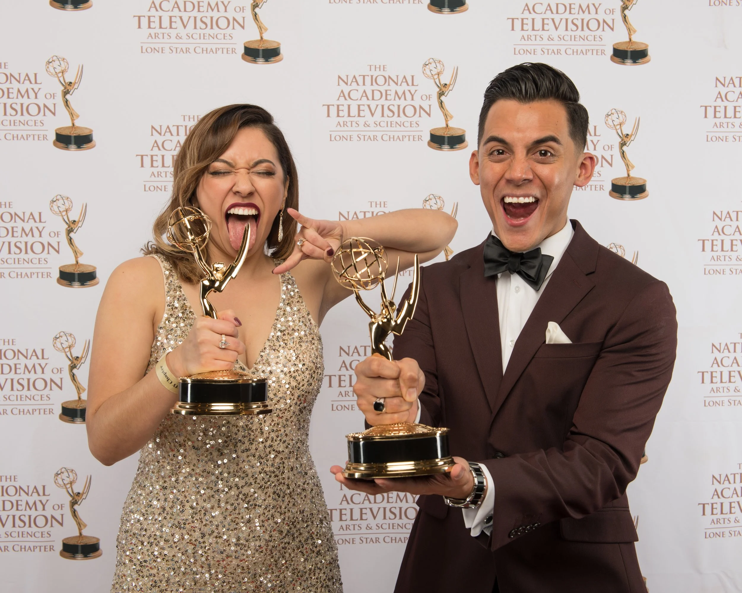 Two professionals celebrating with Emmy Awards at the National Academy of Television Arts & Sciences event, captured by Hector Torres Photography in Texas.