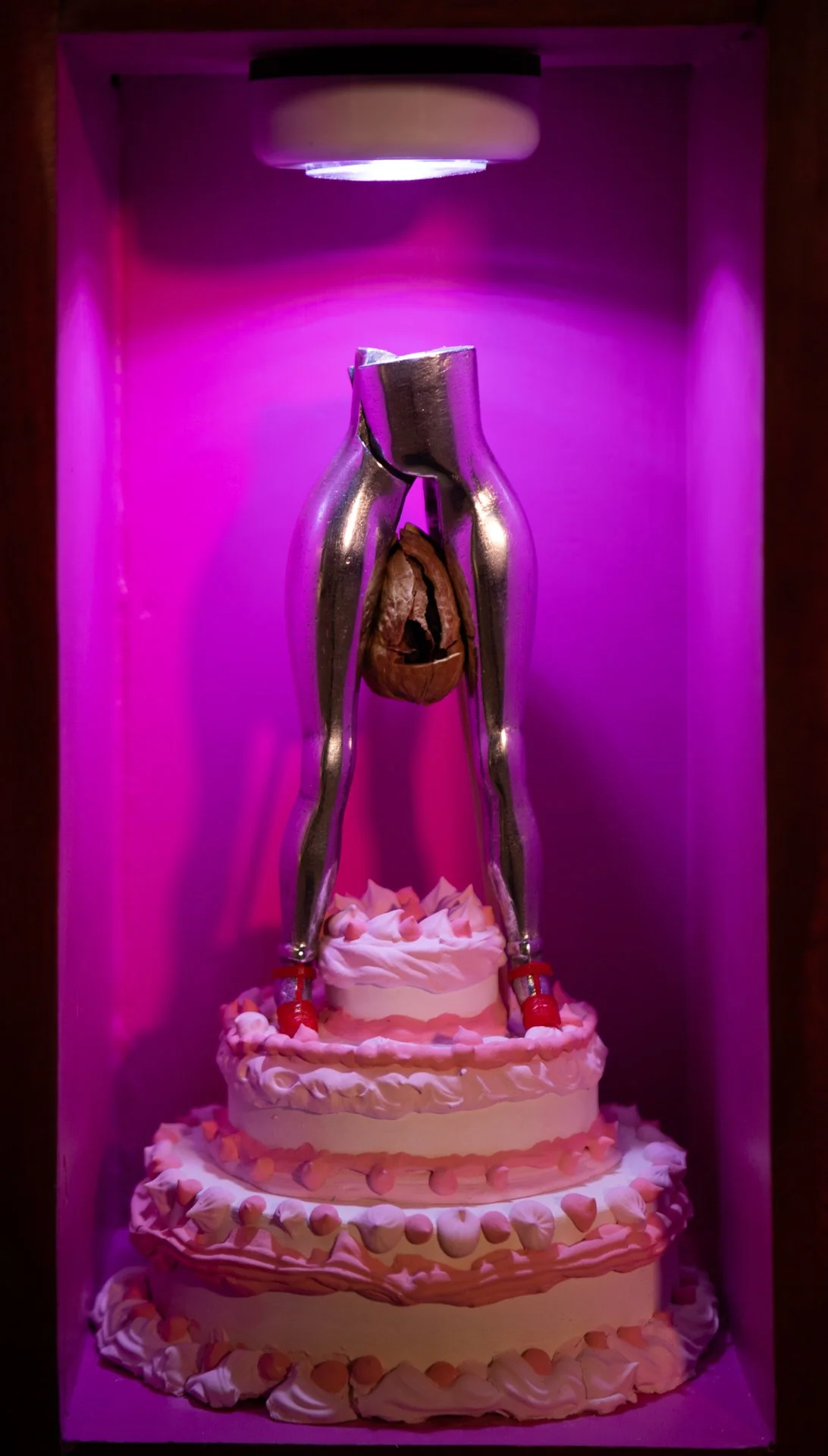 "Feminist Cake Topper" from "The Lunie Bin Playable Characters"
(Found object assemblage)
