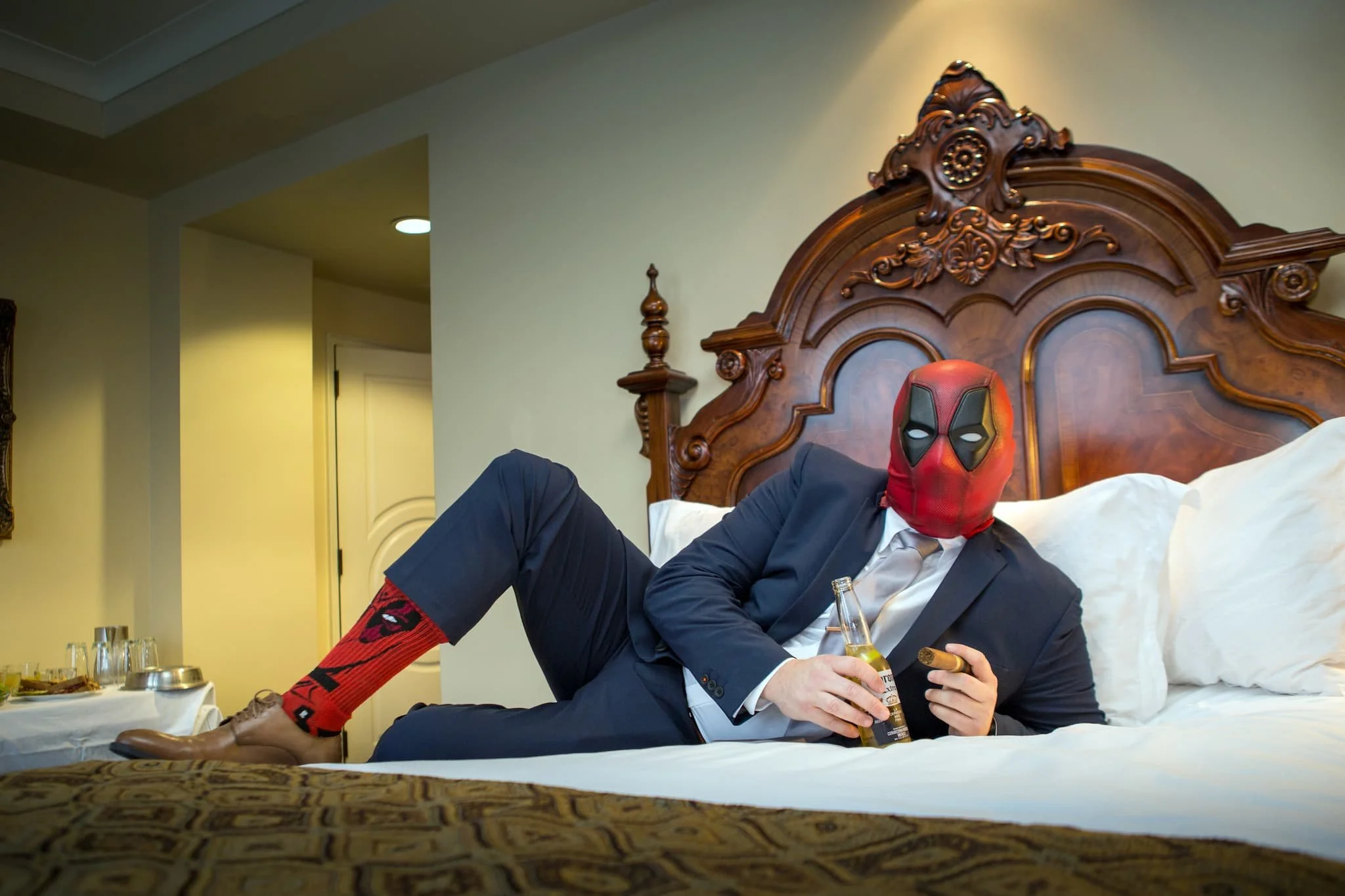 Groom working the camera before theceremony, photographed in a candid, documentary style by a San Antonio wedding photographer focused on real moments.