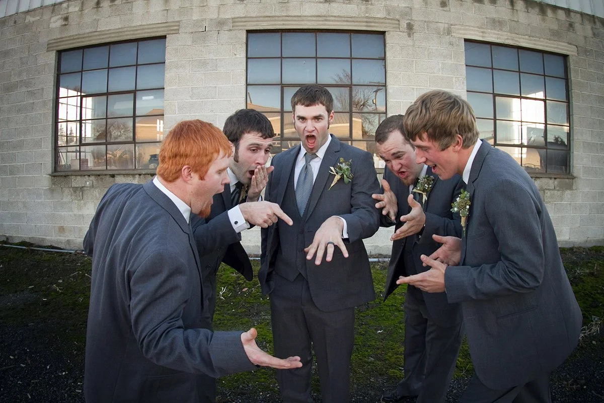 Wedding party moments between the groom and groomsmen, documented unobtrusively to reflect the genuine energy of a San Antonio wedding day.