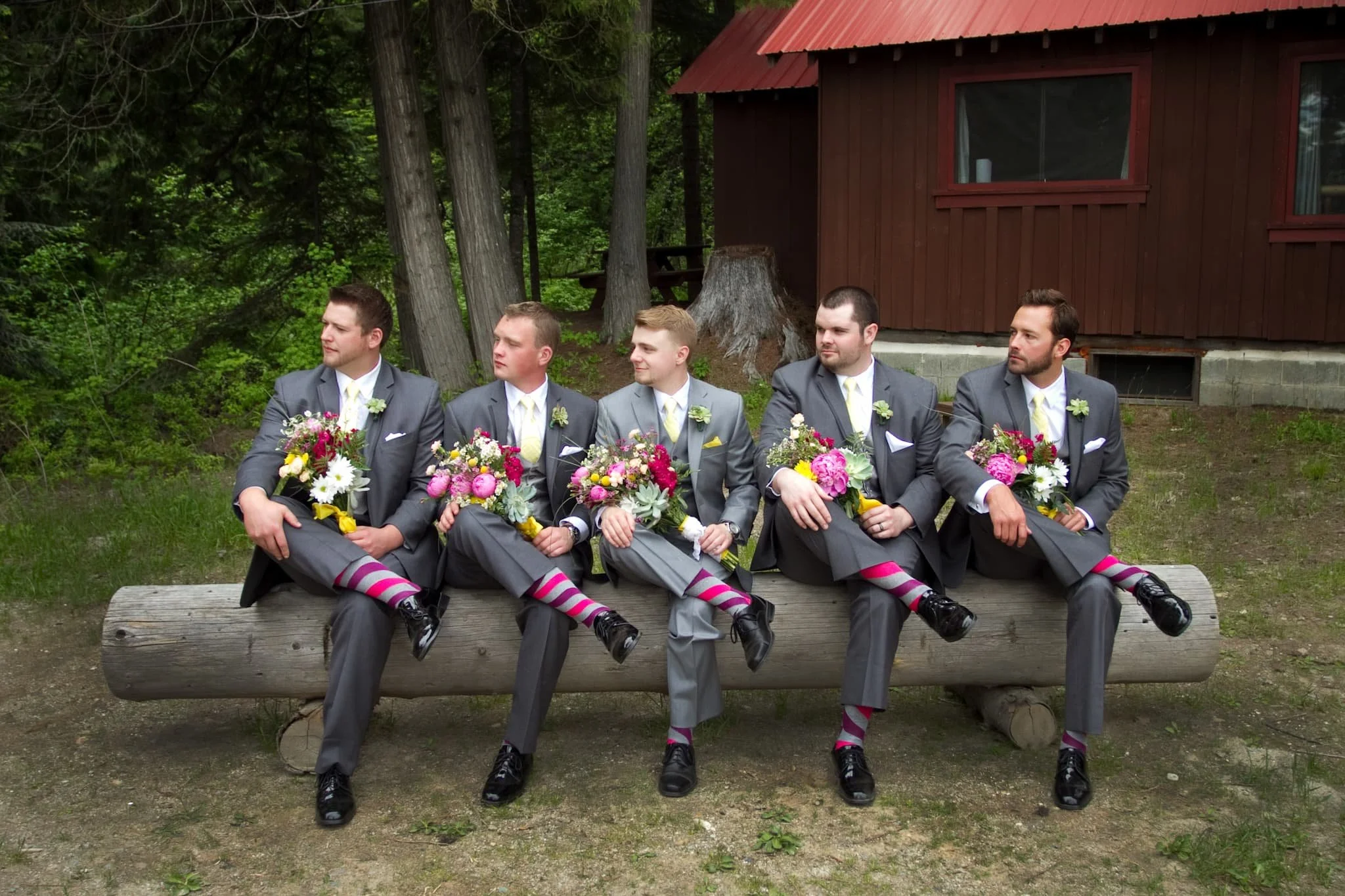 Candid wedding moment of groomsmen captured quietly and honestly, photographed by a San Antonio wedding photographer with a documentary approach and editorial sensibility.