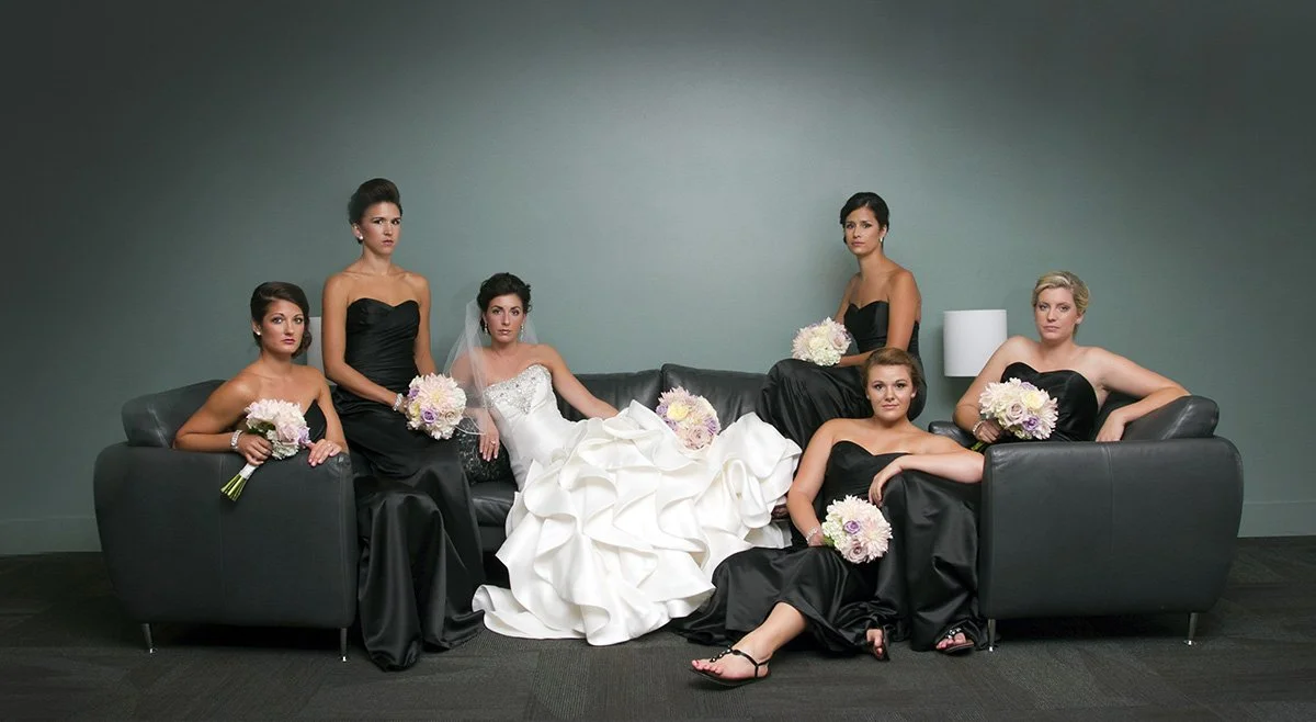 Bride and bridesmaids styled in a couture, magazine-inspired moment, captured with refined composition and fashion-forward wedding photography for San Antonio.
