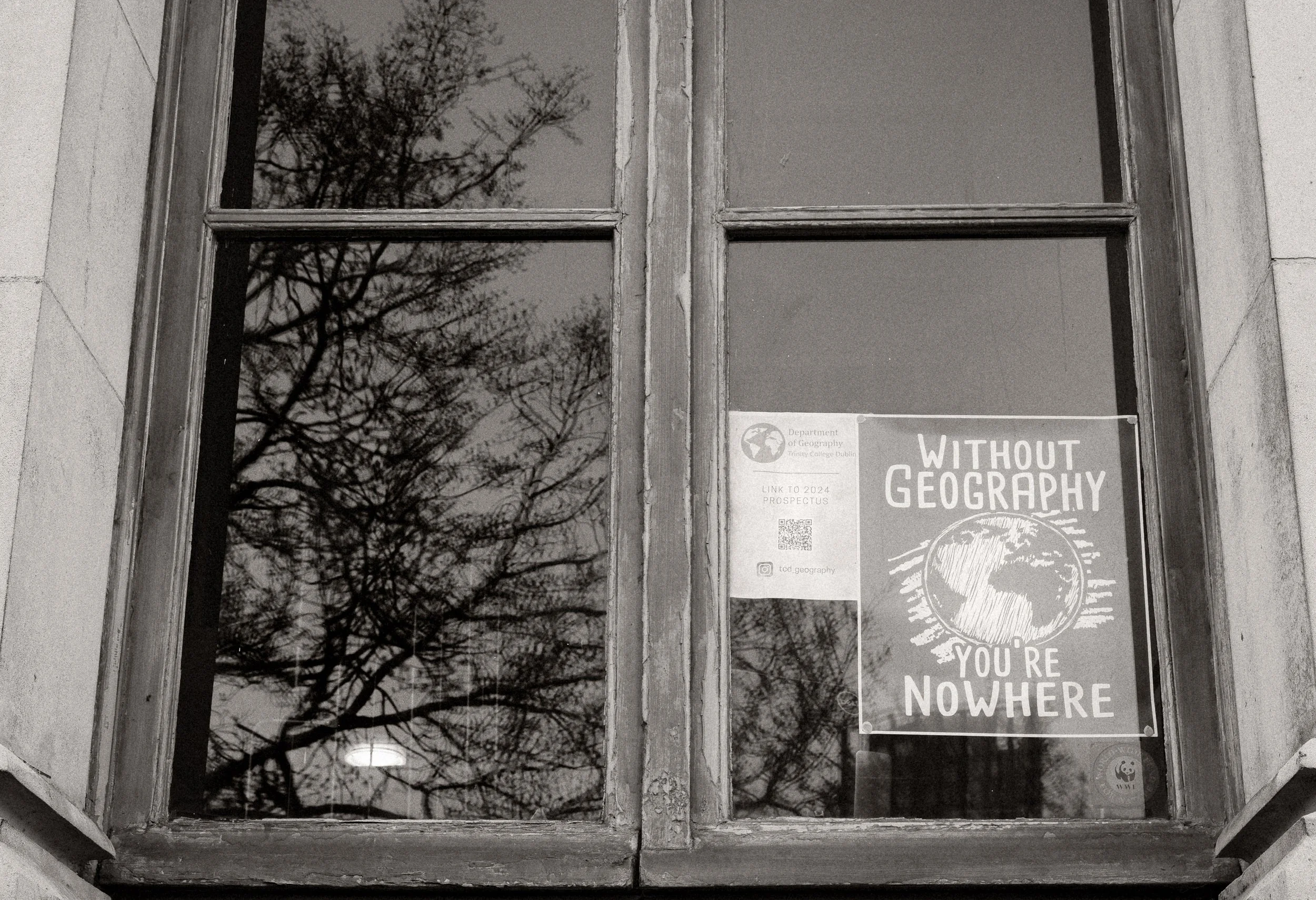 "Without Geography, You're Nowhere" window sign