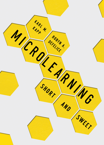 Yellow hexagonal tiles arranged to spell "MICROLEARNING SHORT AND SWEET" with names Karl M. Kapp and Robyn A. Defelice on separate tiles, and additional empty yellow hexagons surrounding them.