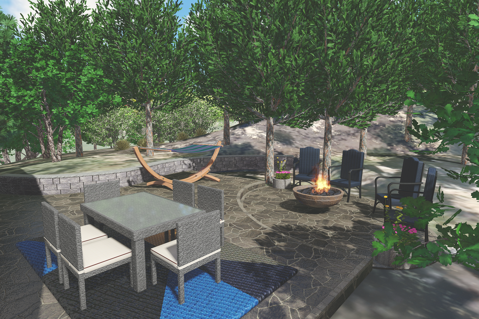Outdoor patio with a dining table and four chairs, a fire pit, a hammock, and trees providing shade.