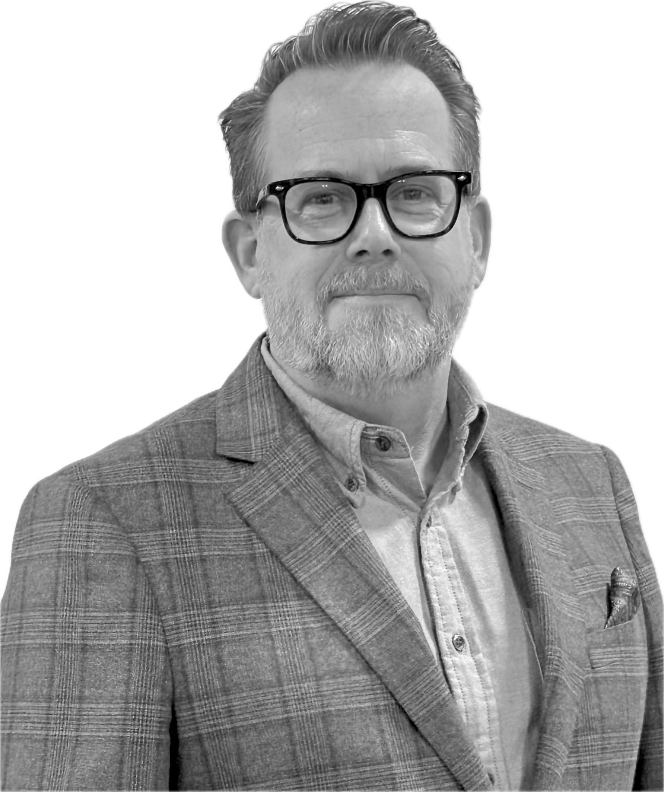Black and white portrait of a middle-aged man with glasses, a beard, wearing a checkered blazer and a collared shirt, against a plain background.