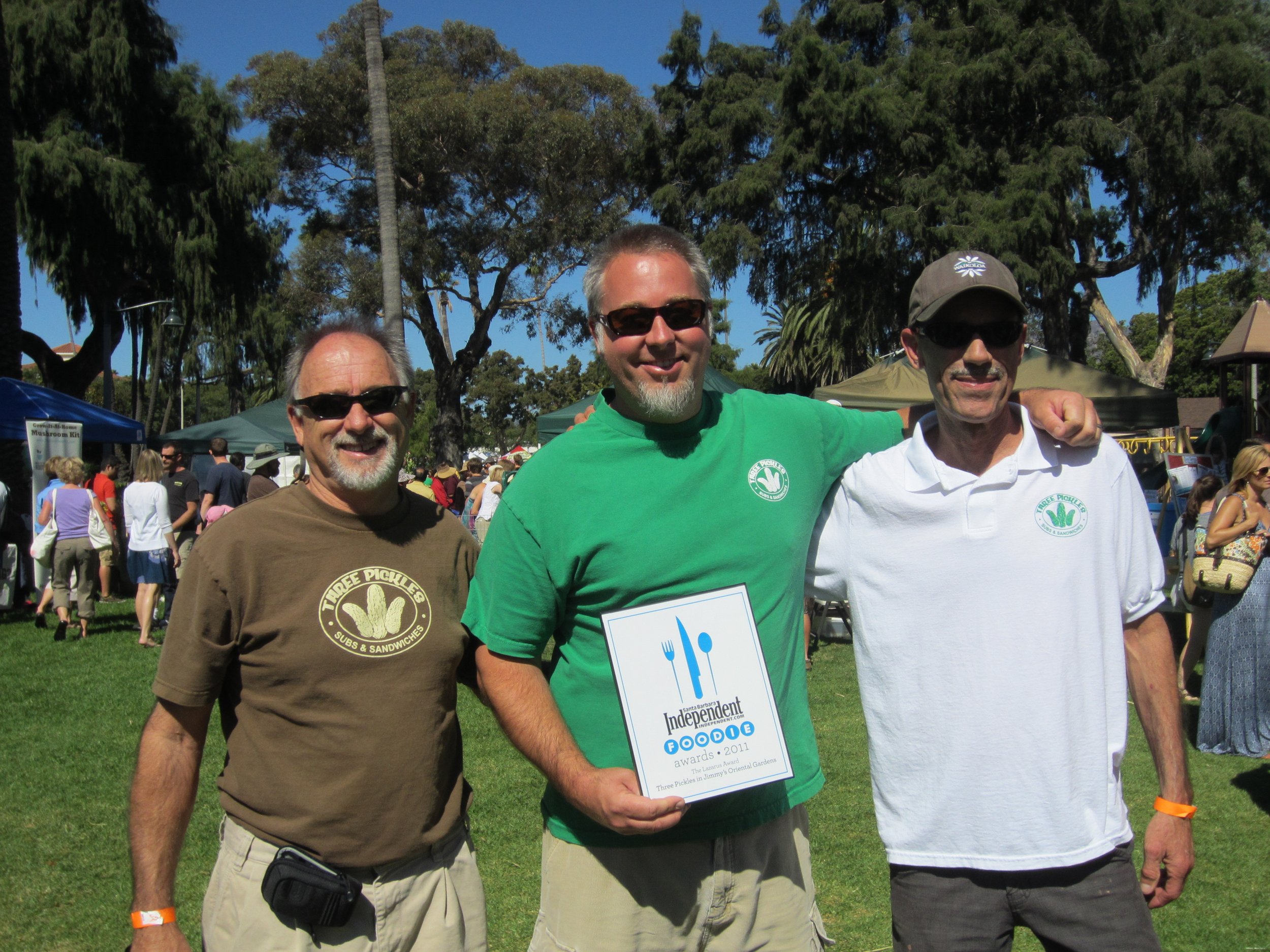 Bob Lovejoy, Clay Lovejoy, and Bob McCourt, the Three Pickles, with their Foodie Award from the Santa Barbara Independent. Photo courtesy of Three Pickles.
