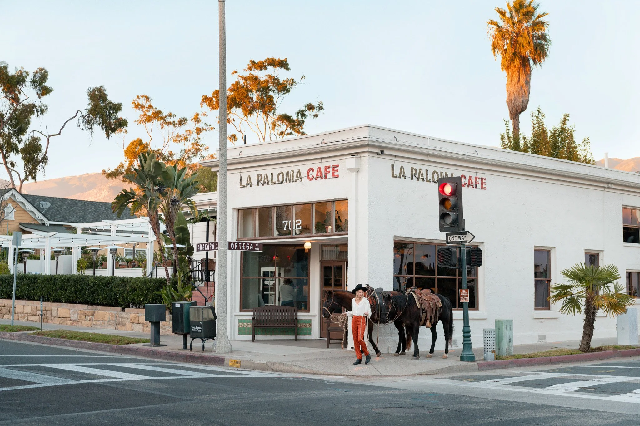 Facade and La Paloma Cafe neon sign