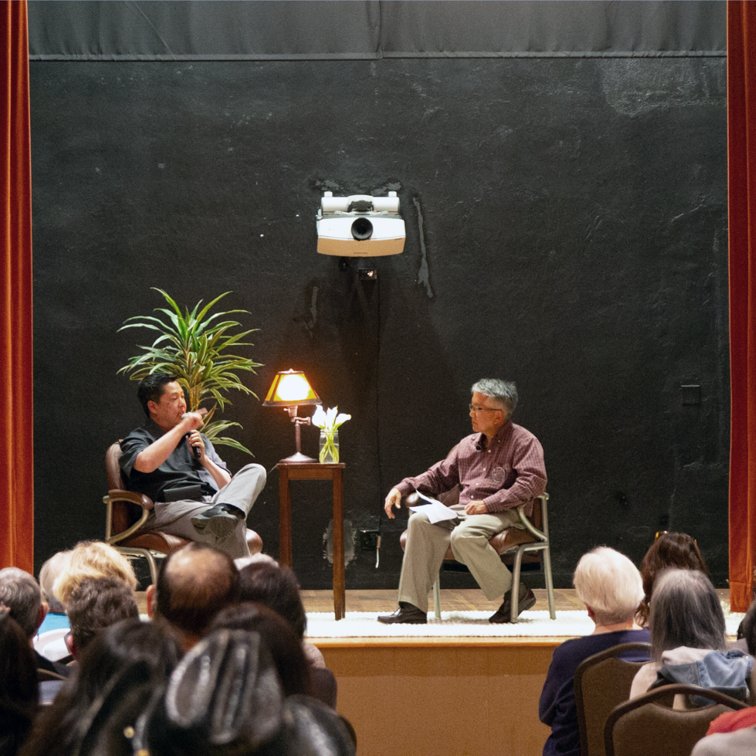 Asian American Film series conversation on stage at the Alhecama Theatre.