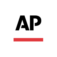 Outline of a newspaper with a folded corner.