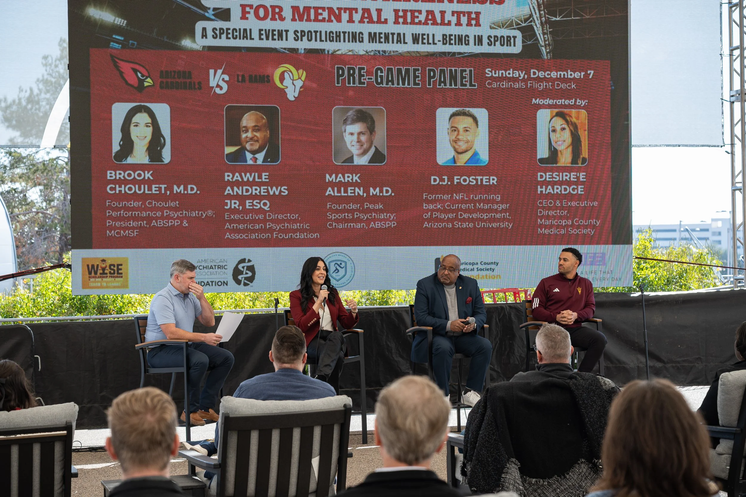 Dr. Brook Choulet speaking at the Arizona Cardinals' Raise Awareness for Mental Health Game pre-game panel in Phoenix, AZ.
