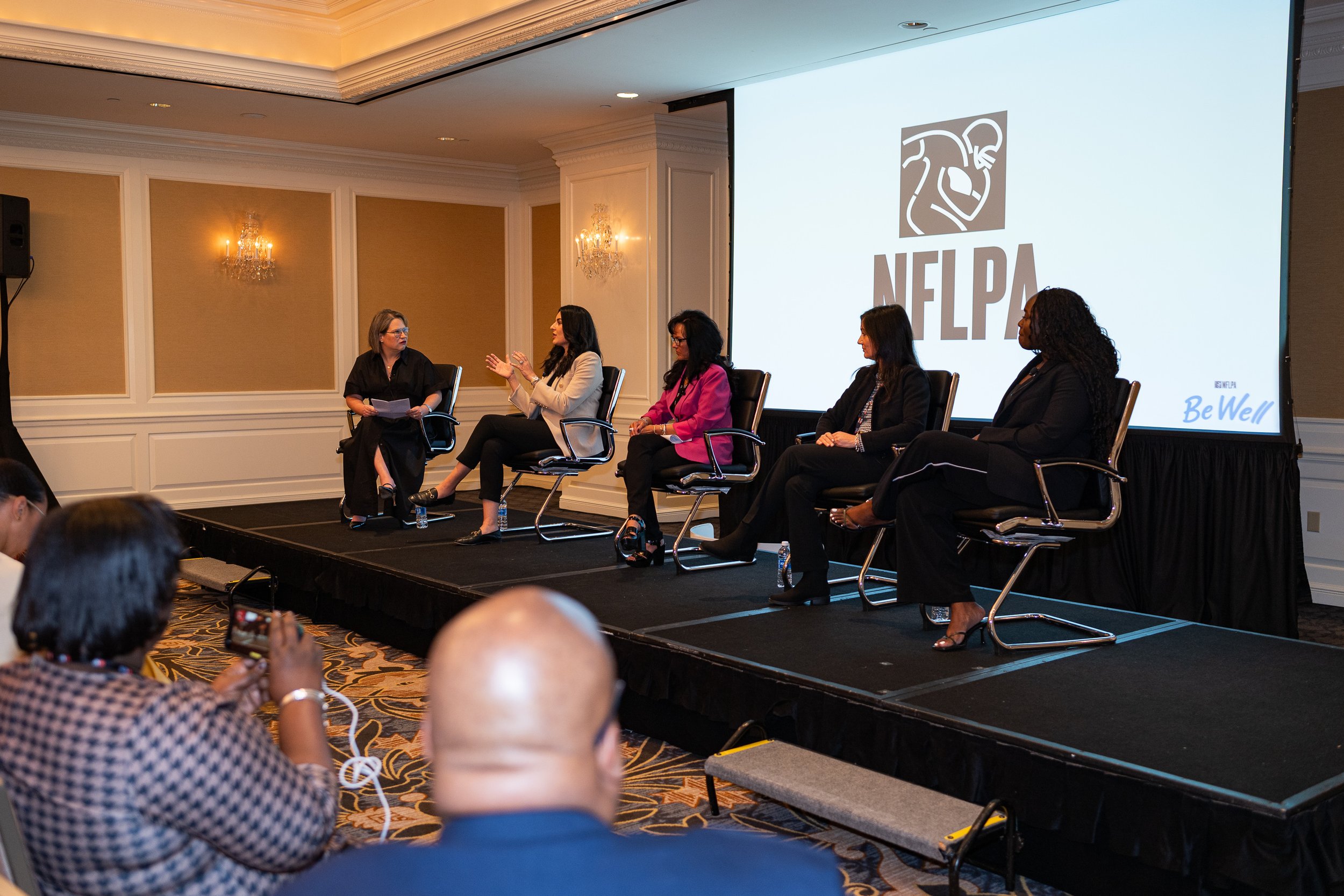 Dr. Brook Choulet speaking at the NFLPA's Be Well Event in San Francisco, CA.