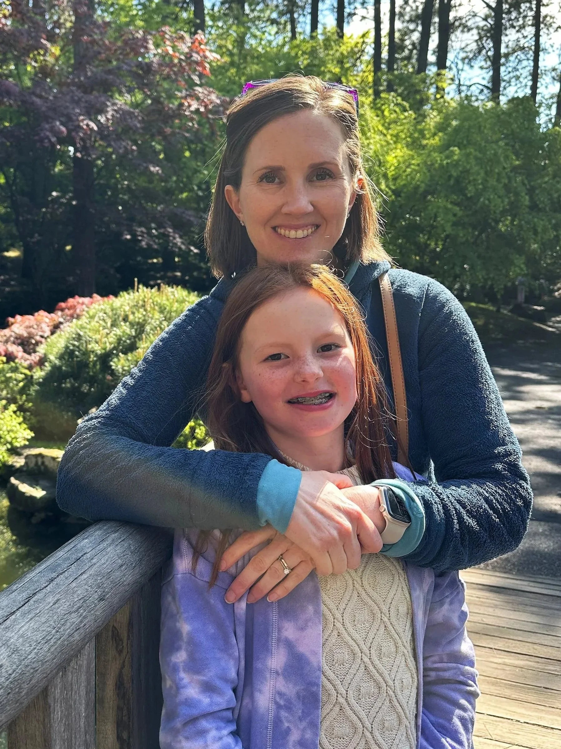 Jennifer Matthews, Spokane lactation consultant and founder of Milk & Motion, pictured with her daughter in a local Spokane park.