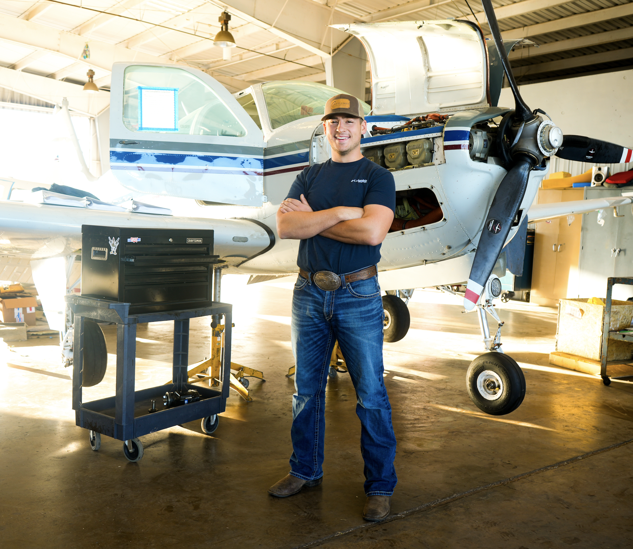 Men's headshot in Fort Worth, Texas at a hangar. Aviation headshots Fort Worth, Texas. Fort Worth, Texas headshots.
