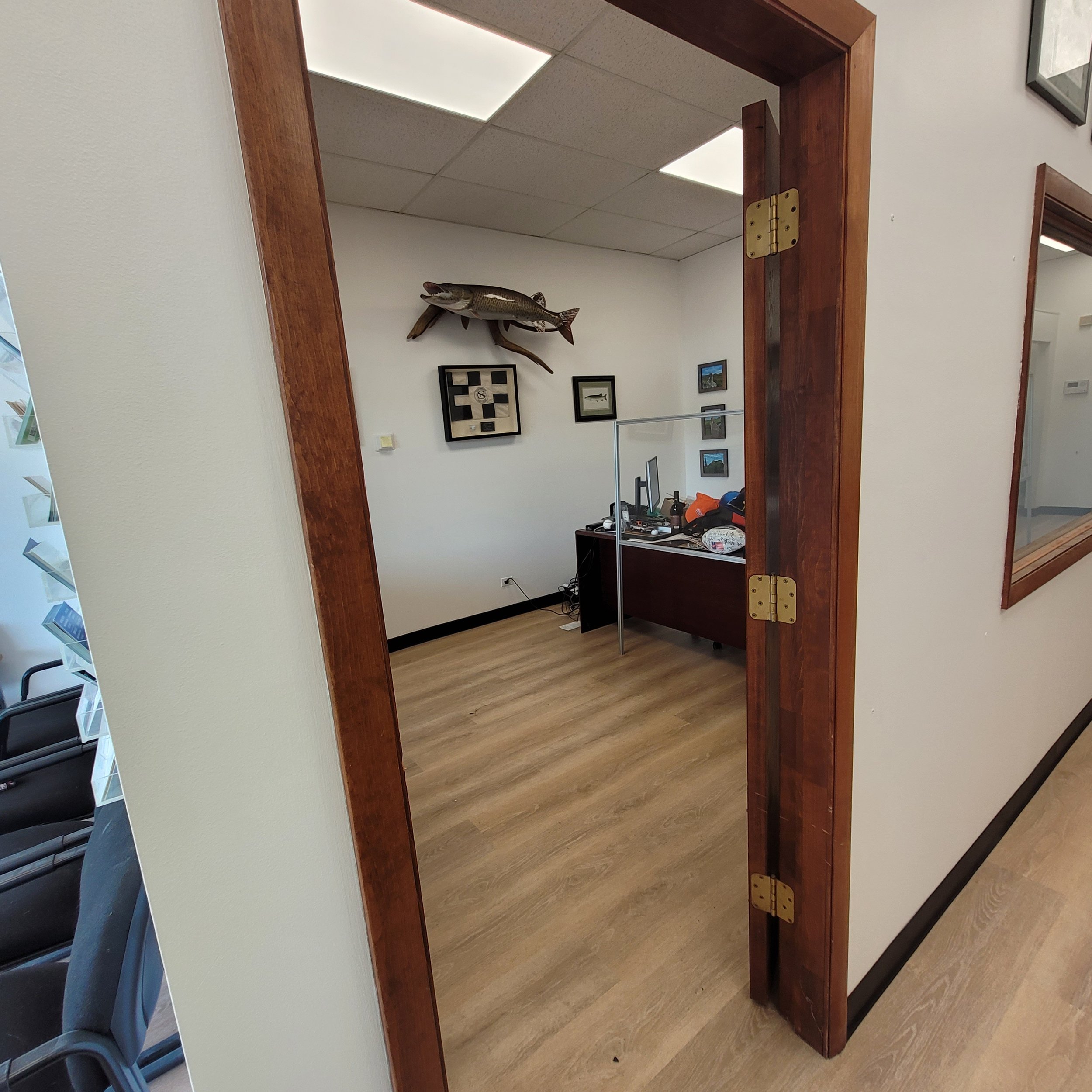 Finished small office local business remodel with new flooring, new ceiling, and a fresh new paint job