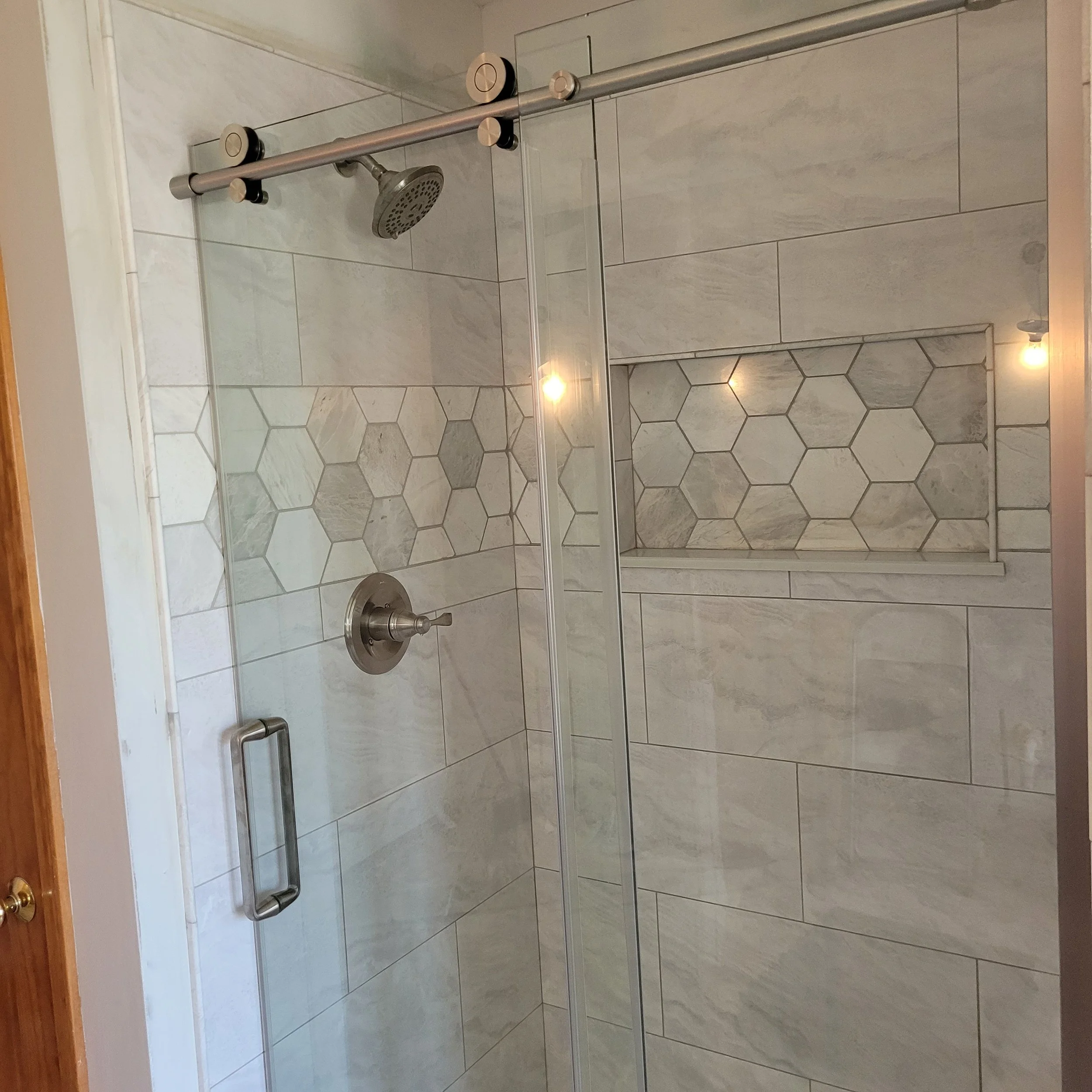 finished remodel with new king suite shower, new tiles, fixtures, flooring, shower bench
