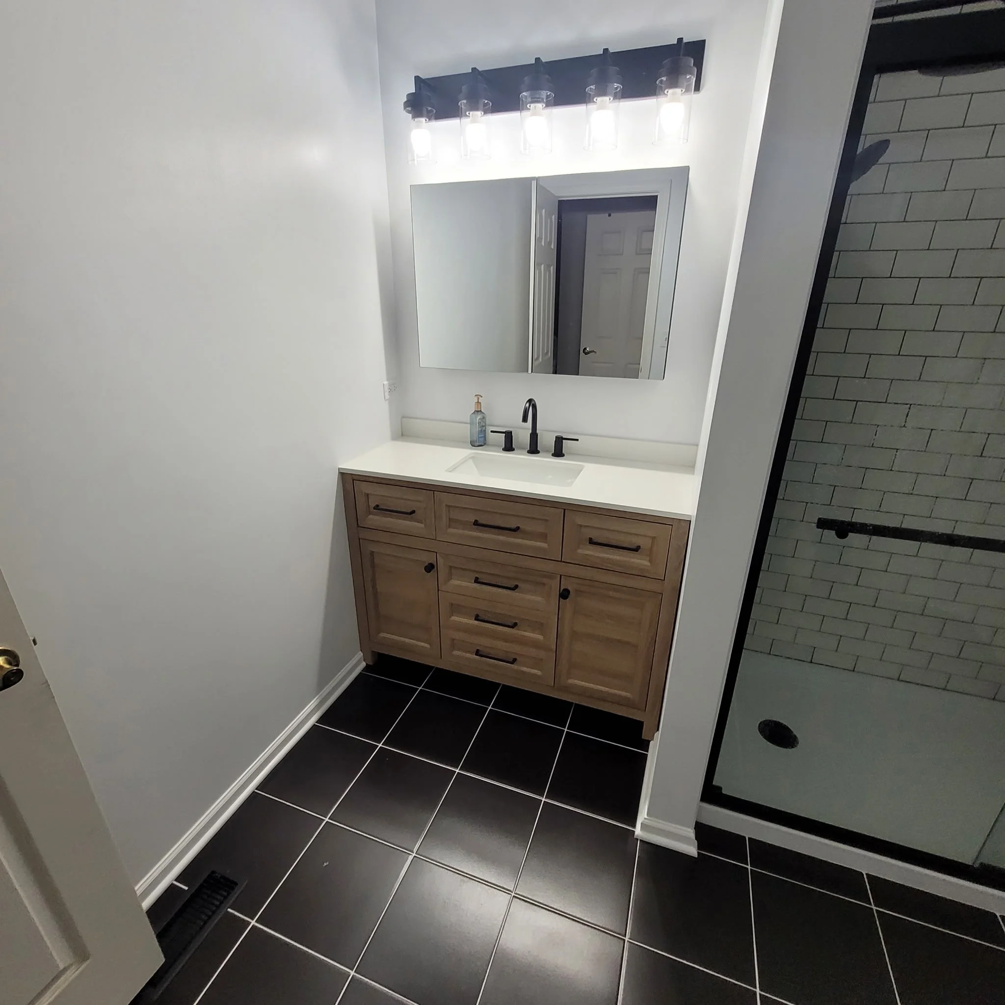 finished bathroom remodel - expert work, new sink, flooring, tile, shower