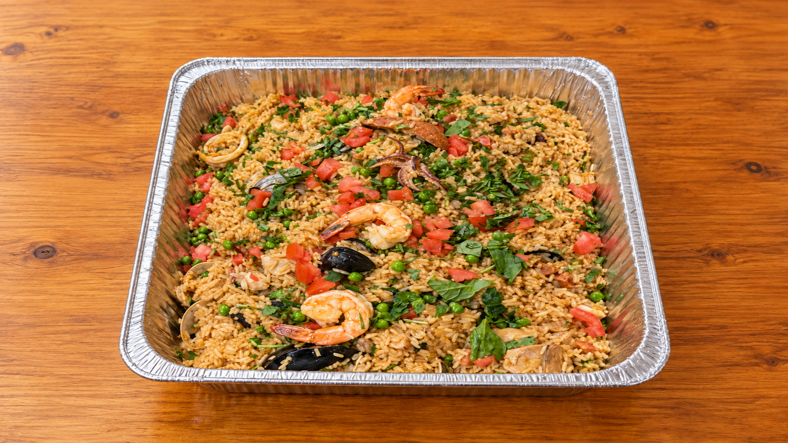 Centered+paella+tray+on+wooden+table.png