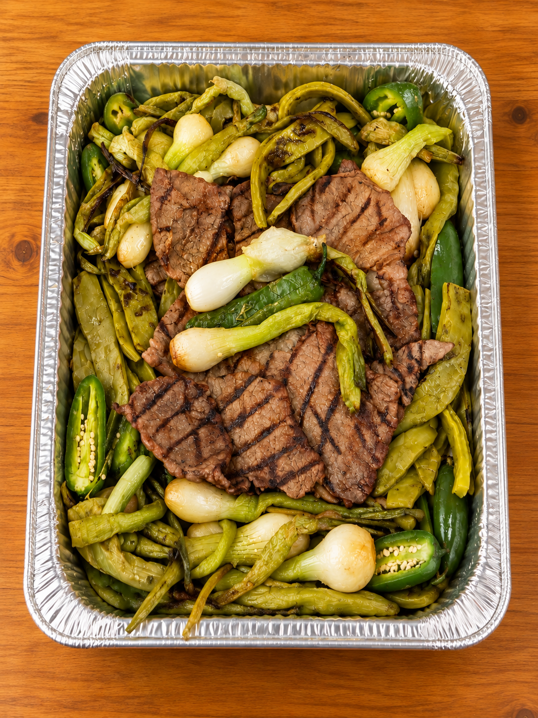 Polished carne asada catering tray.png