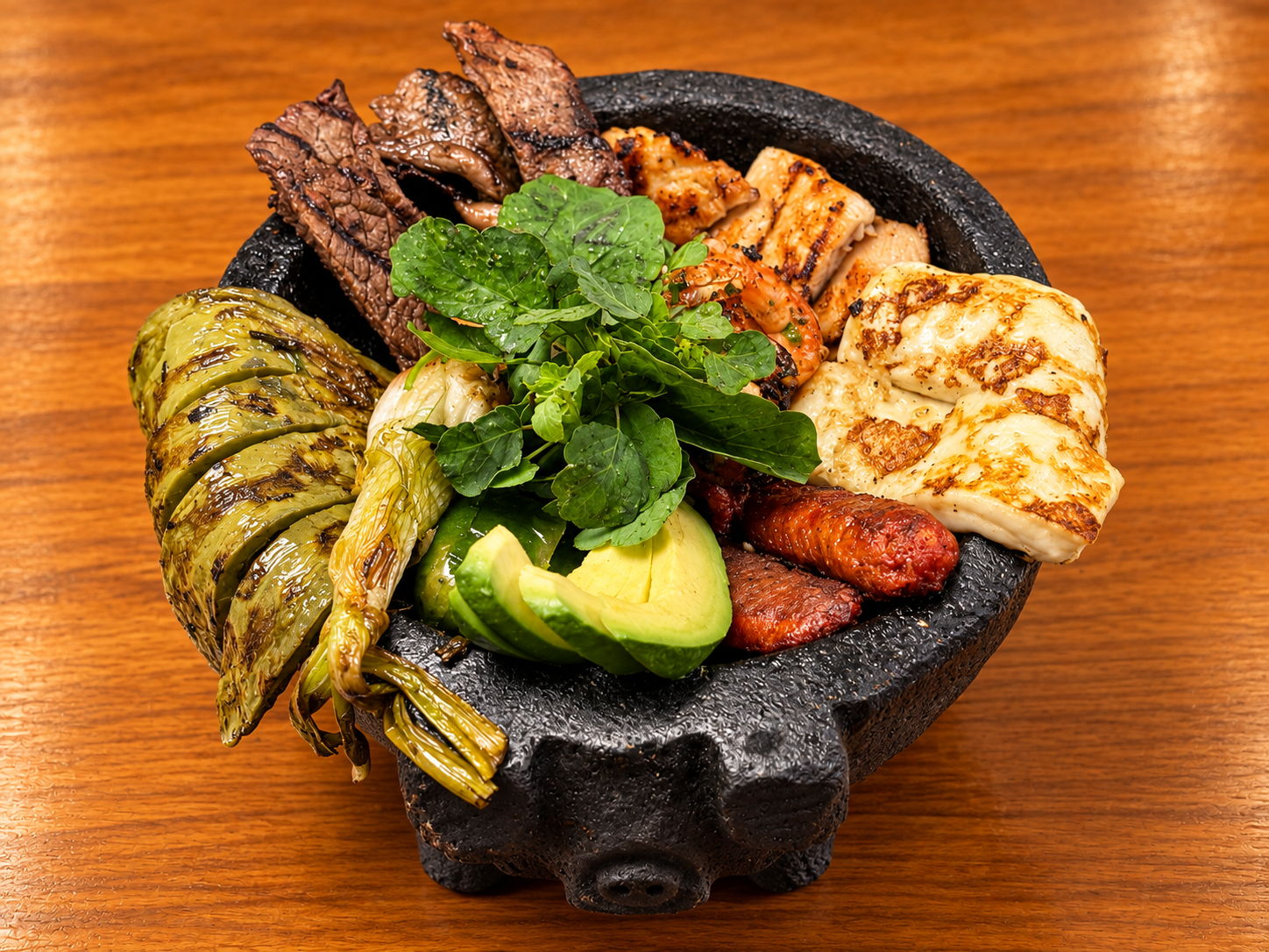 Mixed grill in a pig-shaped molcajete.png