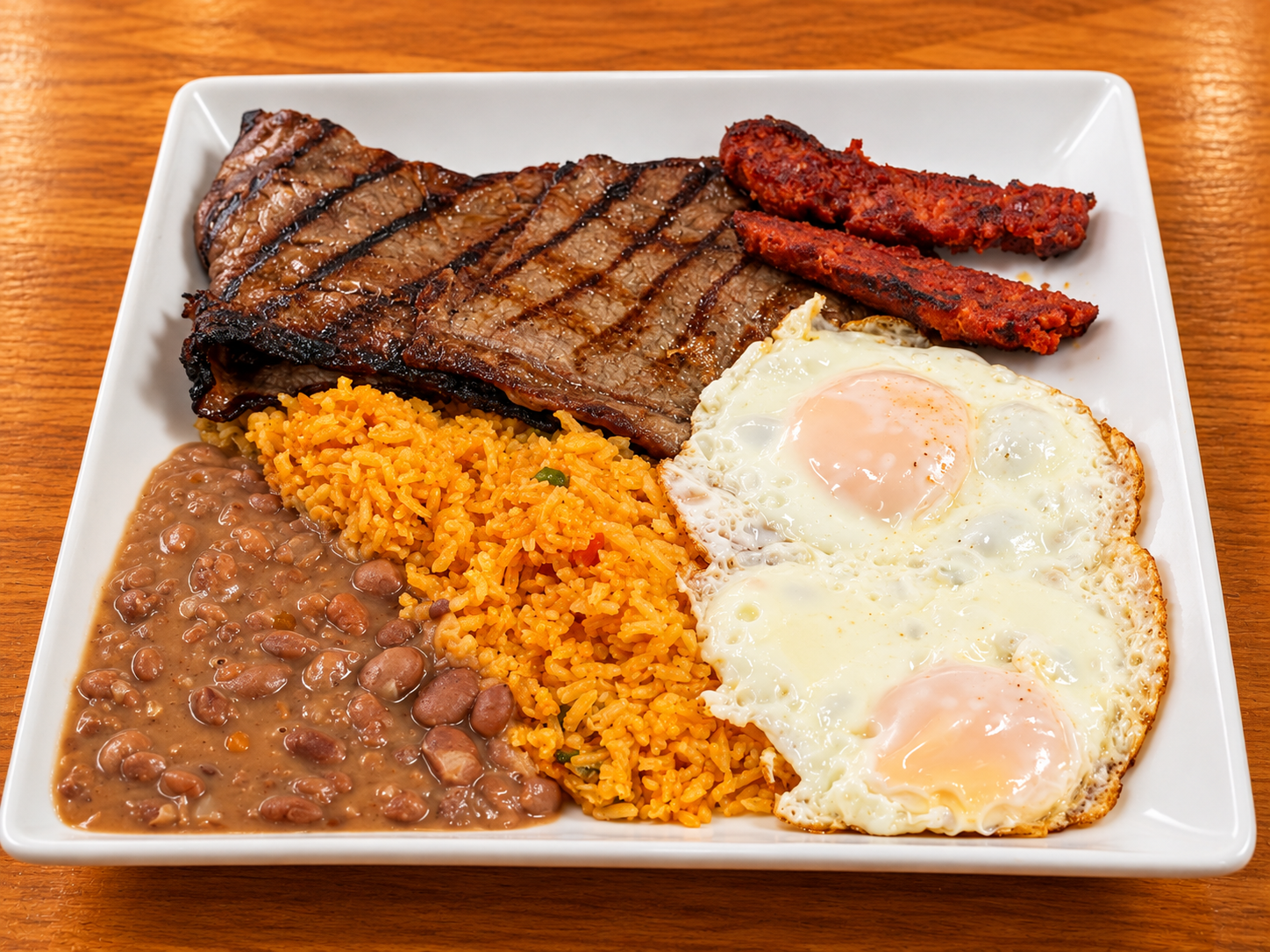 Mexican grilled steak plate with eggs.png