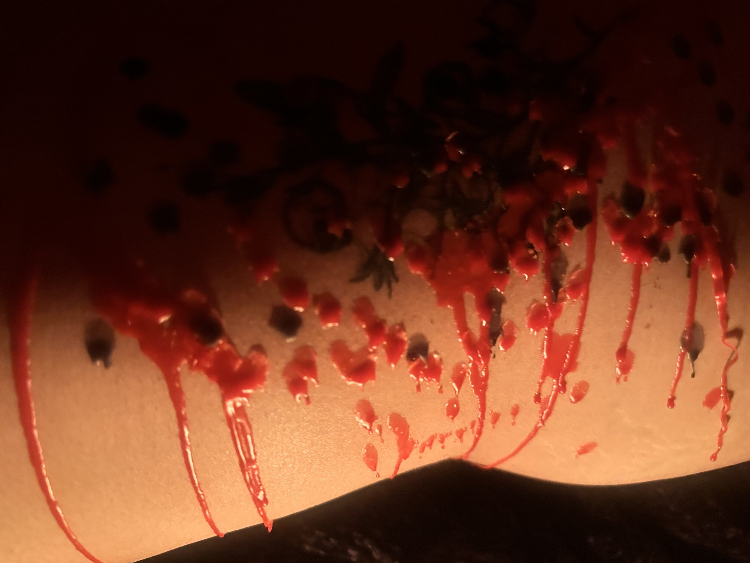 Close-up of cherry toppings with red syrup on a dessert or pastry