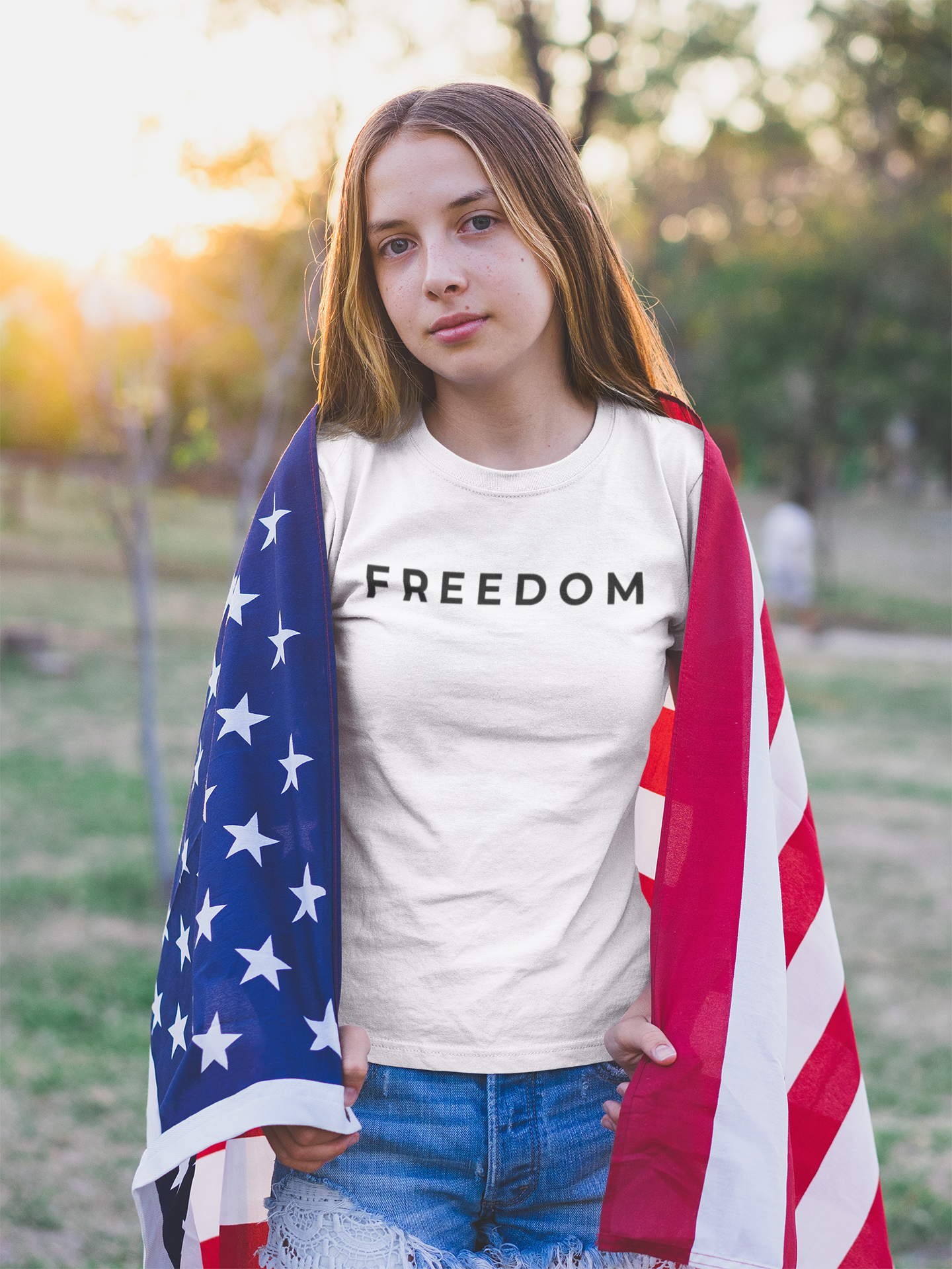 girl-with-the-american-flag-on-her-back-wearing-a-t-shirt-mockup-a20709.png