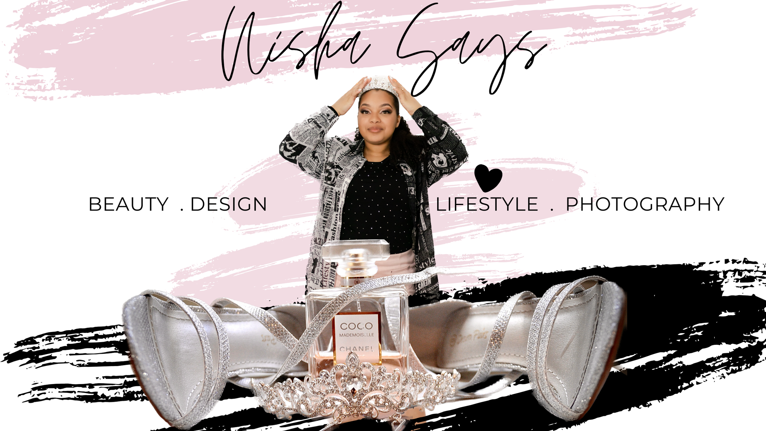 A woman with long curly hair, wearing a patterned jacket and black shirt with white dots, holding her head with both hands, standing in front of a pink and black artistic background with the text "Nisha Says" written above her. The background also fe