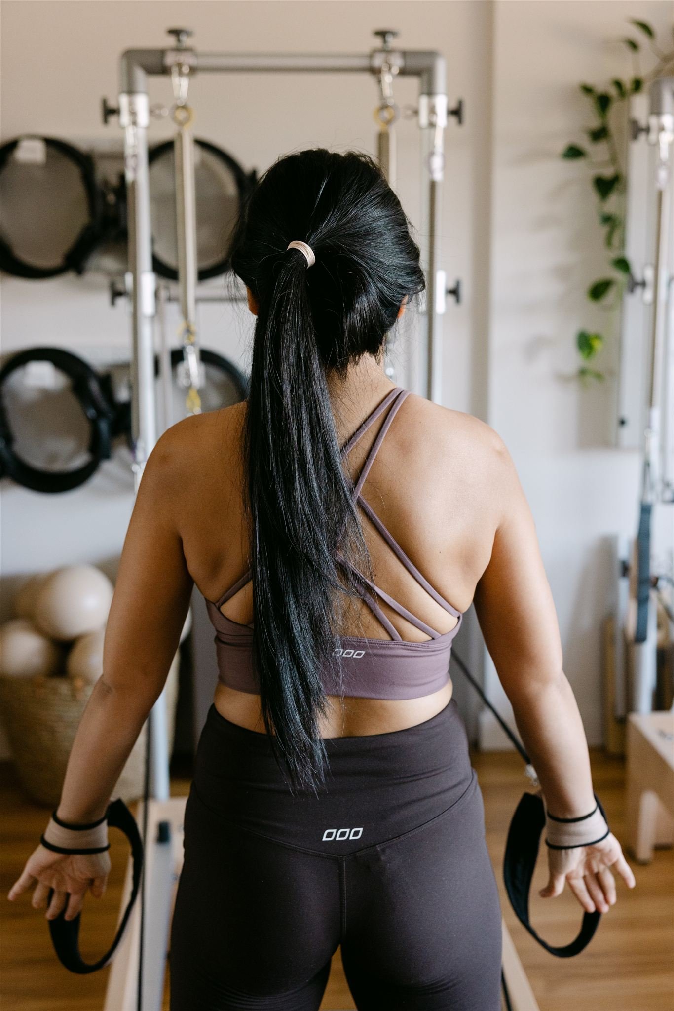 woman on a reformer machine